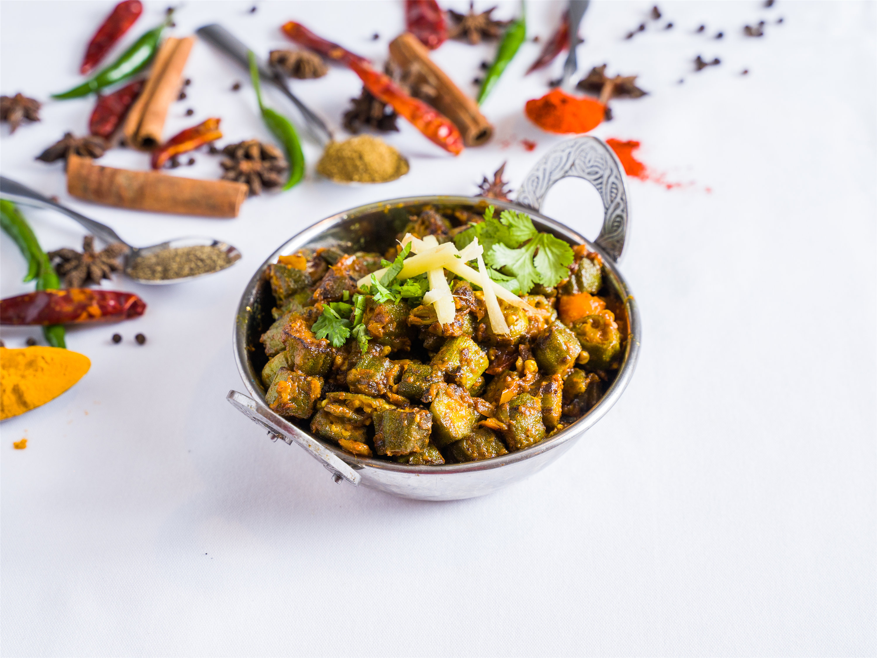 Order Bhindi Masala food online from Cotillion store, Jericho on bringmethat.com