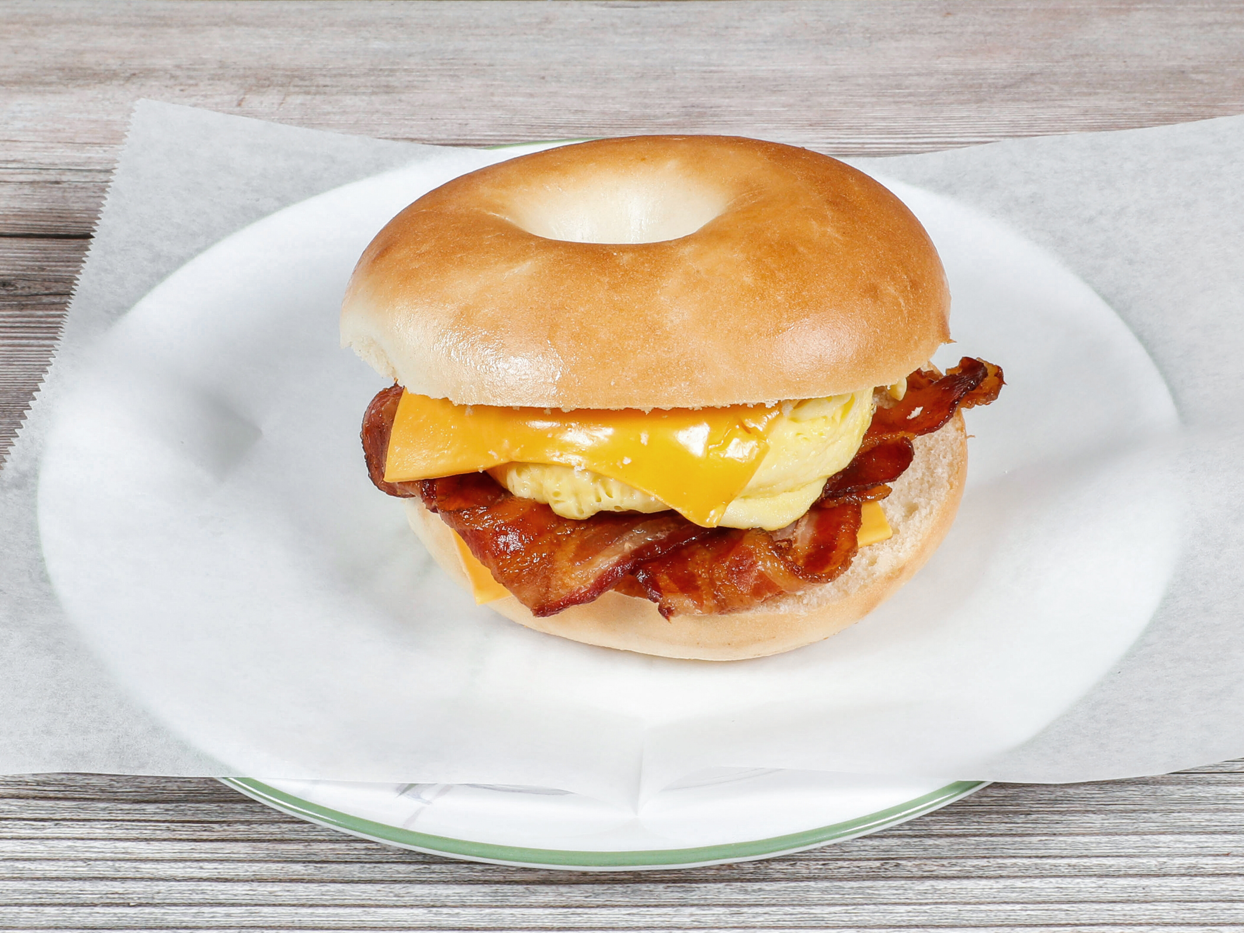 Order 4.  Bagel Breakfast: Bacon, Egg and Cheese food online from Dawn Donuts store, San Jose on bringmethat.com