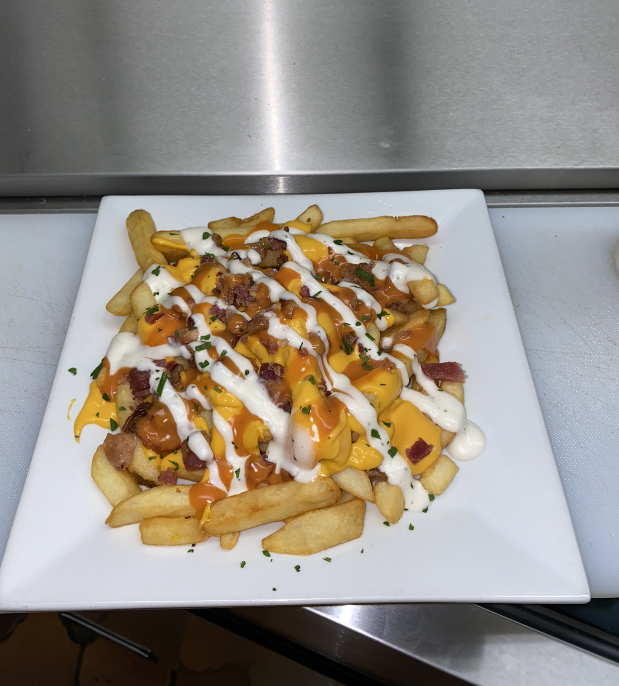 Order Loaded Bacon Fries food online from Dino Italian Restaurant store, Wilkes-Barre on bringmethat.com