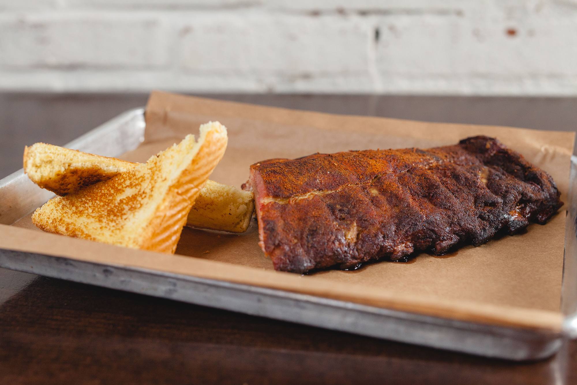 Order Baby Back Ribs food online from Doc Crow Southern Smokehouse store, Louisville on bringmethat.com