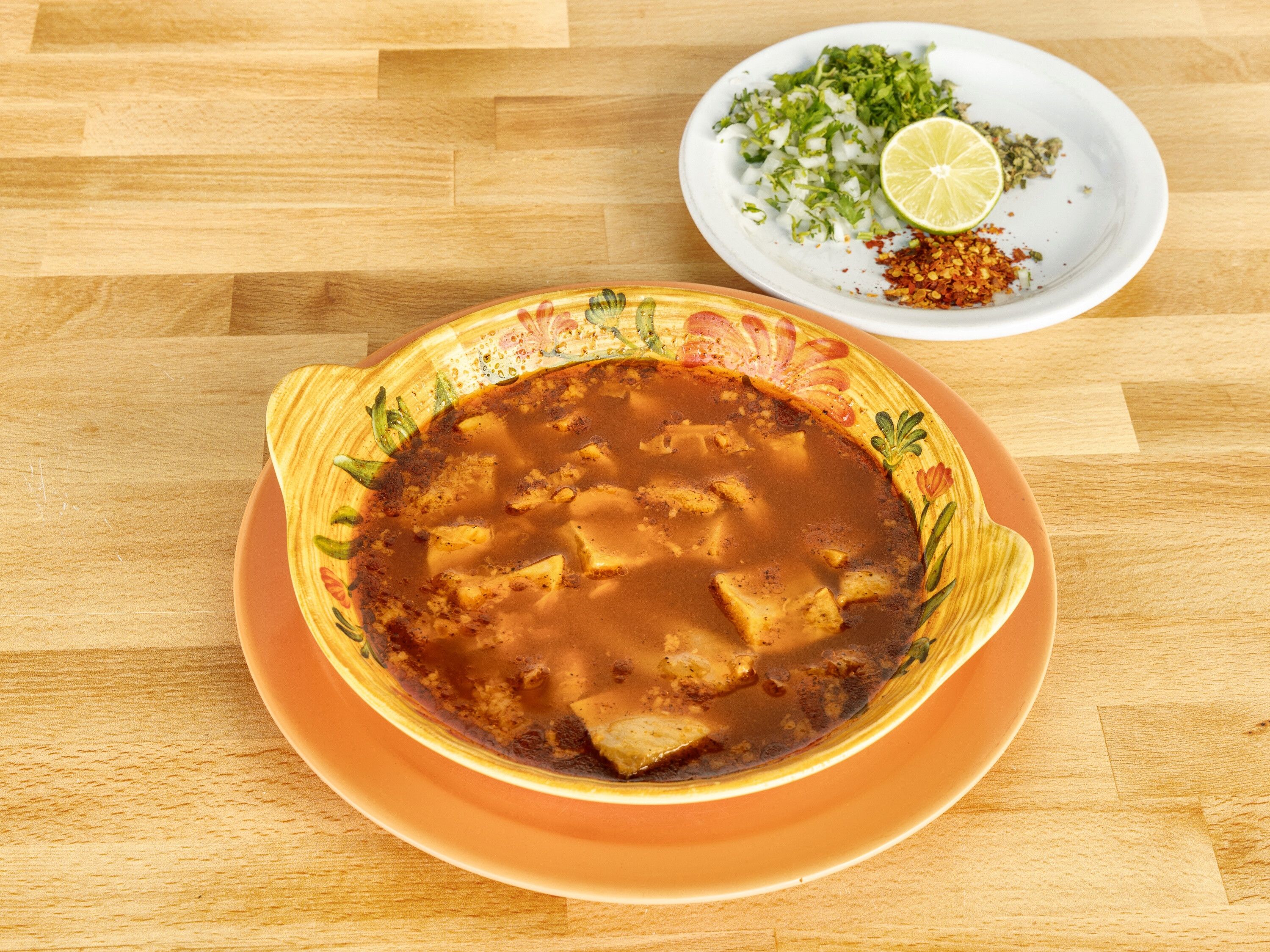 Order Menudo Soup food online from Taqueria Alonzo store, Corvallis on bringmethat.com