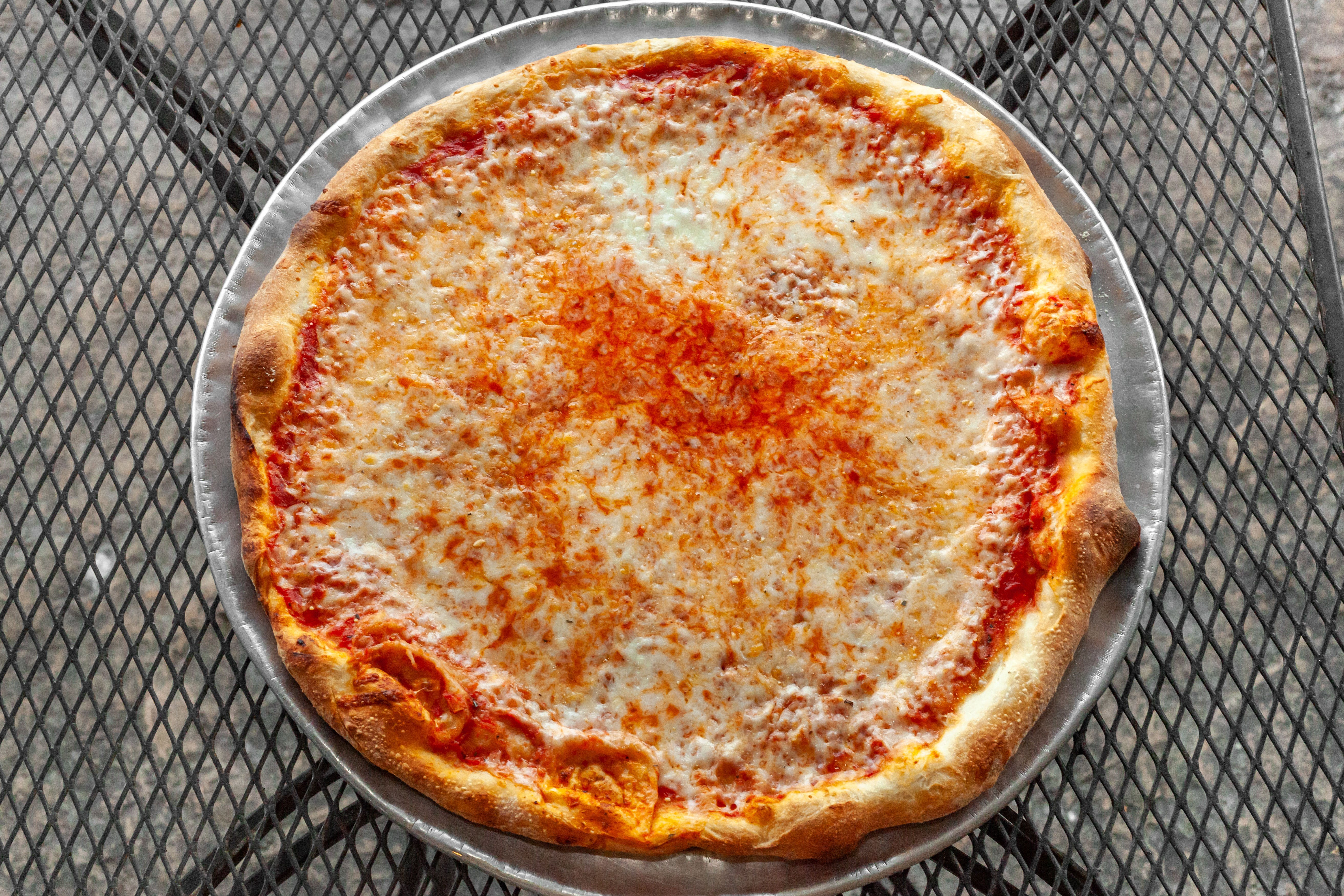 Order Our Traditional Cheese Pizza - Small 10" food online from Italian Delight of Powhatan store, Powhatan on bringmethat.com