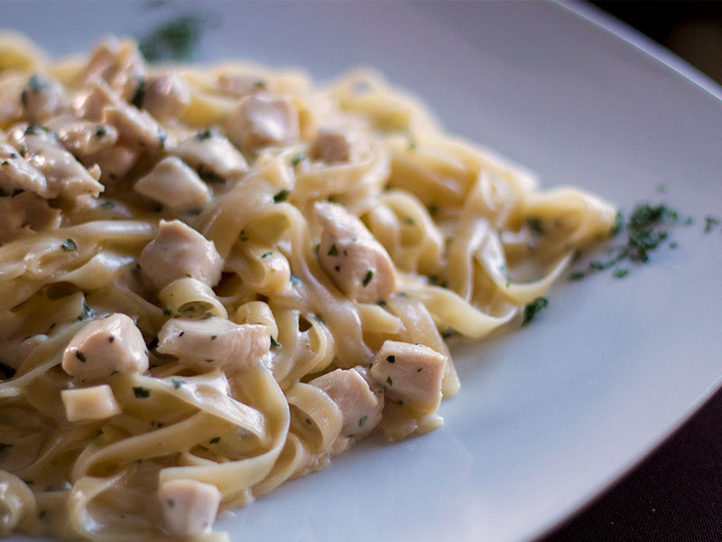 Order Fettuccine Alfredo with Grilled Chicken food online from Rosati's Pizza store, Lewisville on bringmethat.com