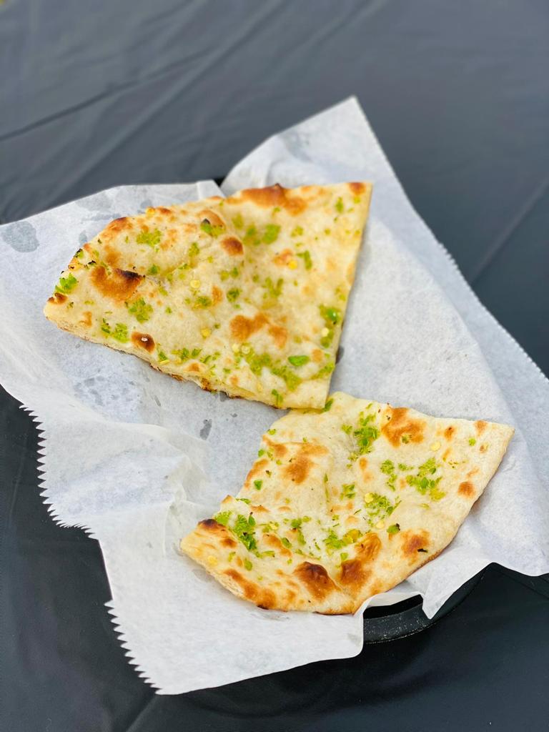 Order Garlic Naan food online from Kabobs Indian Grill store, Minneapolis on bringmethat.com