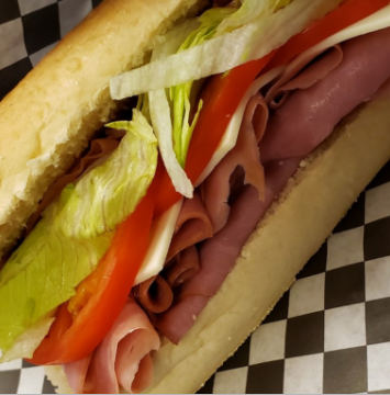 Order Ham Sub food online from Magic Subs And Gyros store, Barberton on bringmethat.com