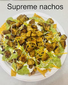 Order Supreme Nachos food online from Super Burritos Mexican Food store, Redding on bringmethat.com