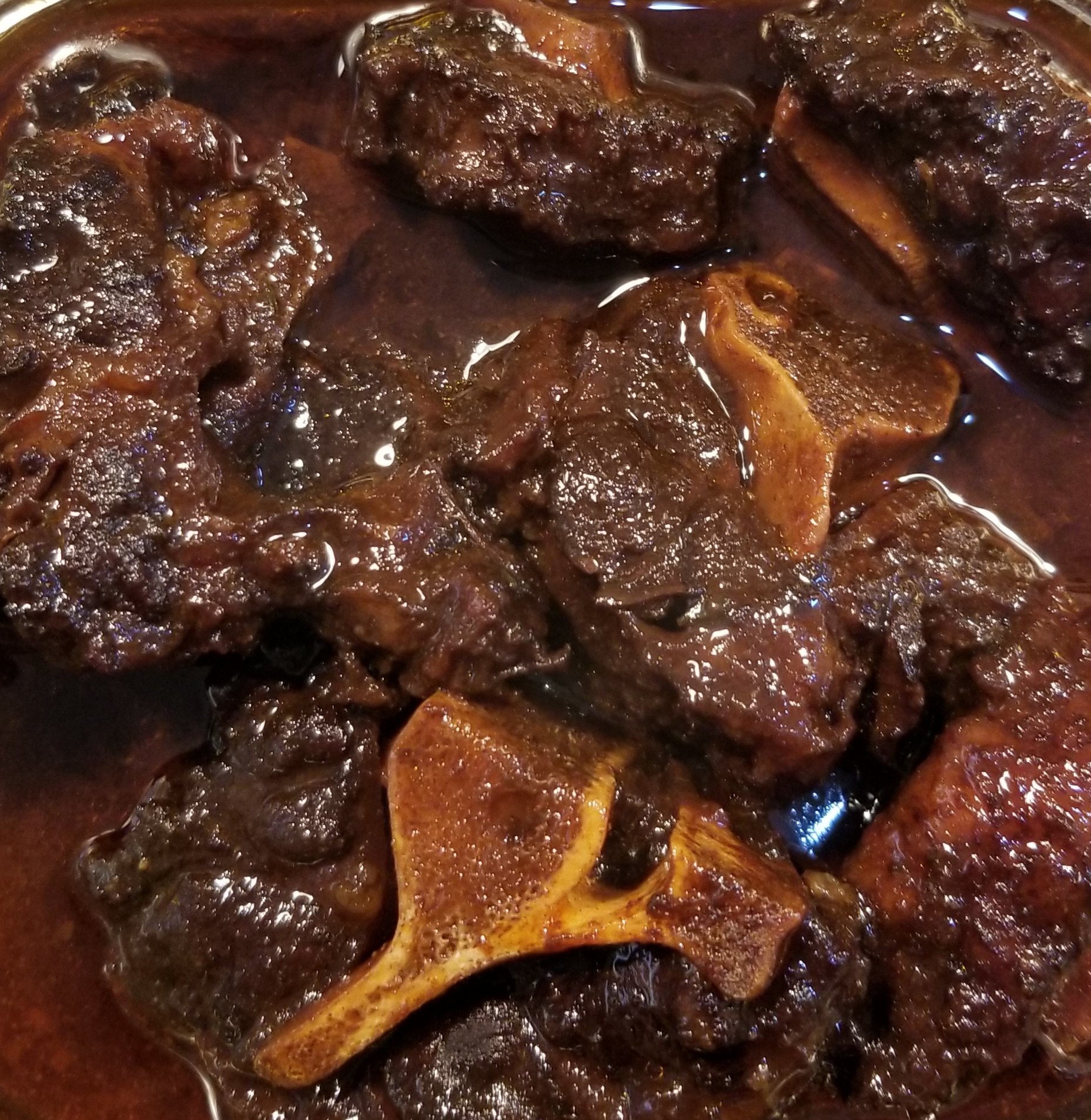 Order Oxtails food online from Jerk Off The Grill store, New York NY on bringmethat.com