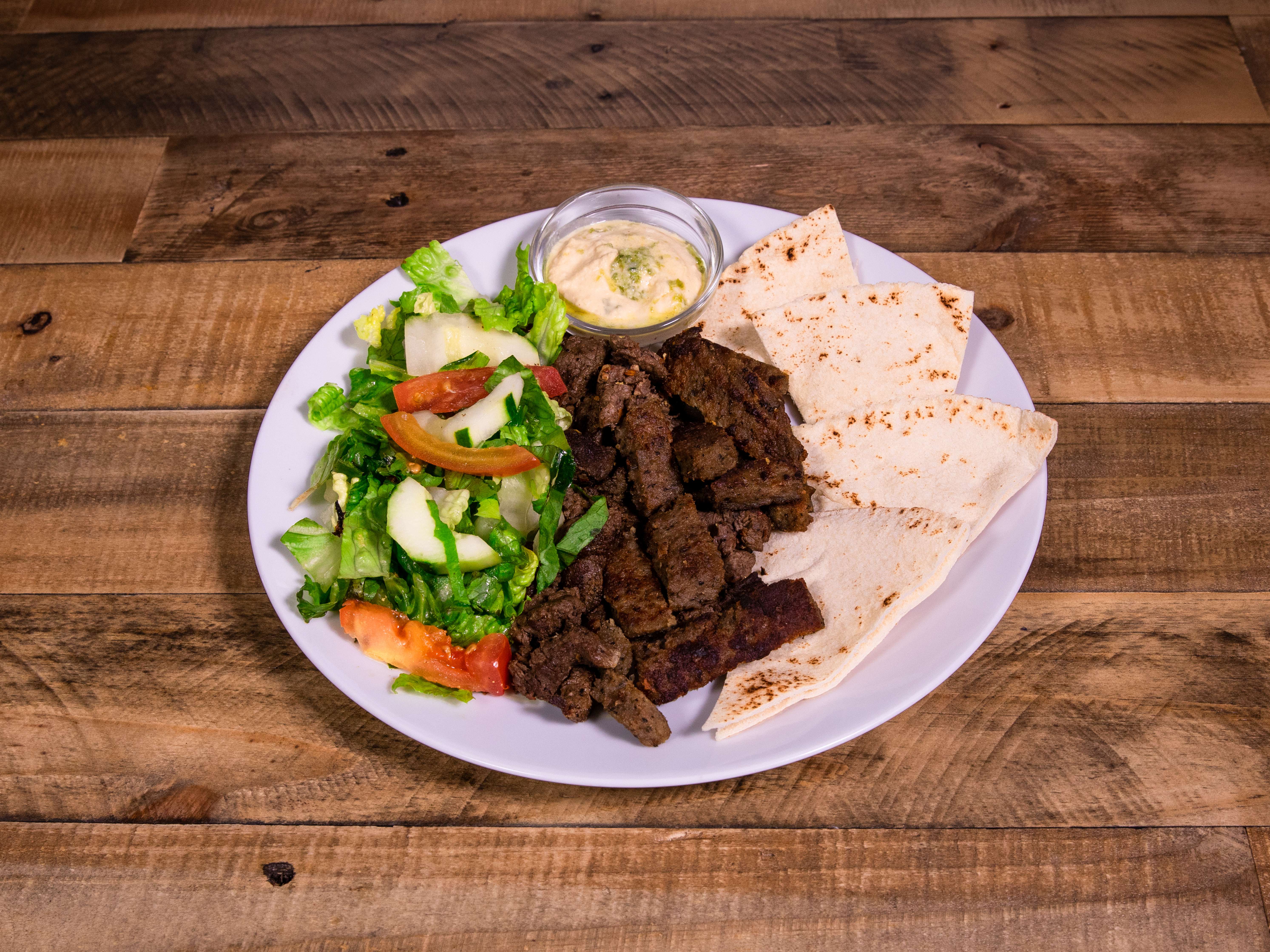 Order Gyro Plate food online from Mona's Cafe store, New Orleans on bringmethat.com