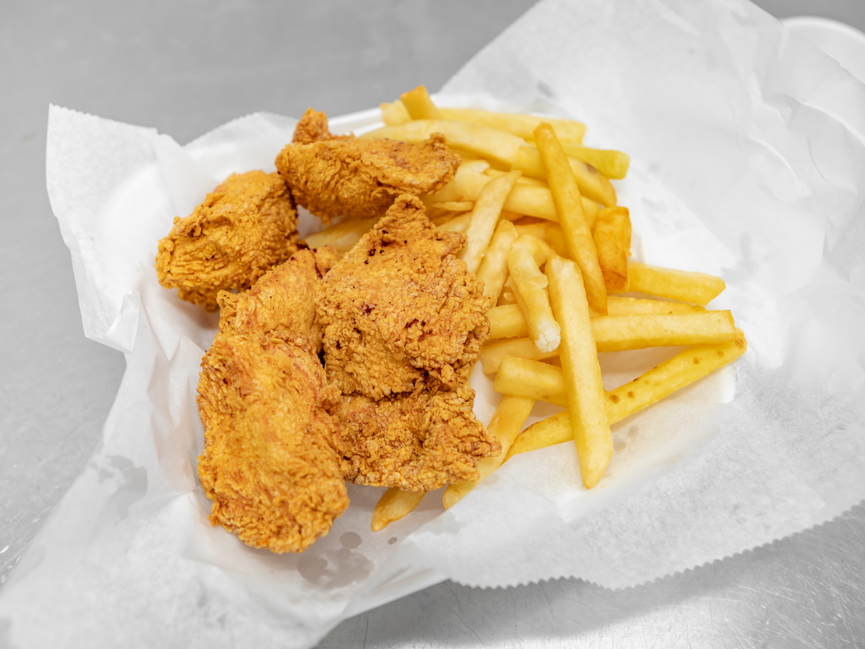 Order 3. Chicken Tenders Dinner food online from Pops Fish & Chicken Market store, Fairview Heights on bringmethat.com
