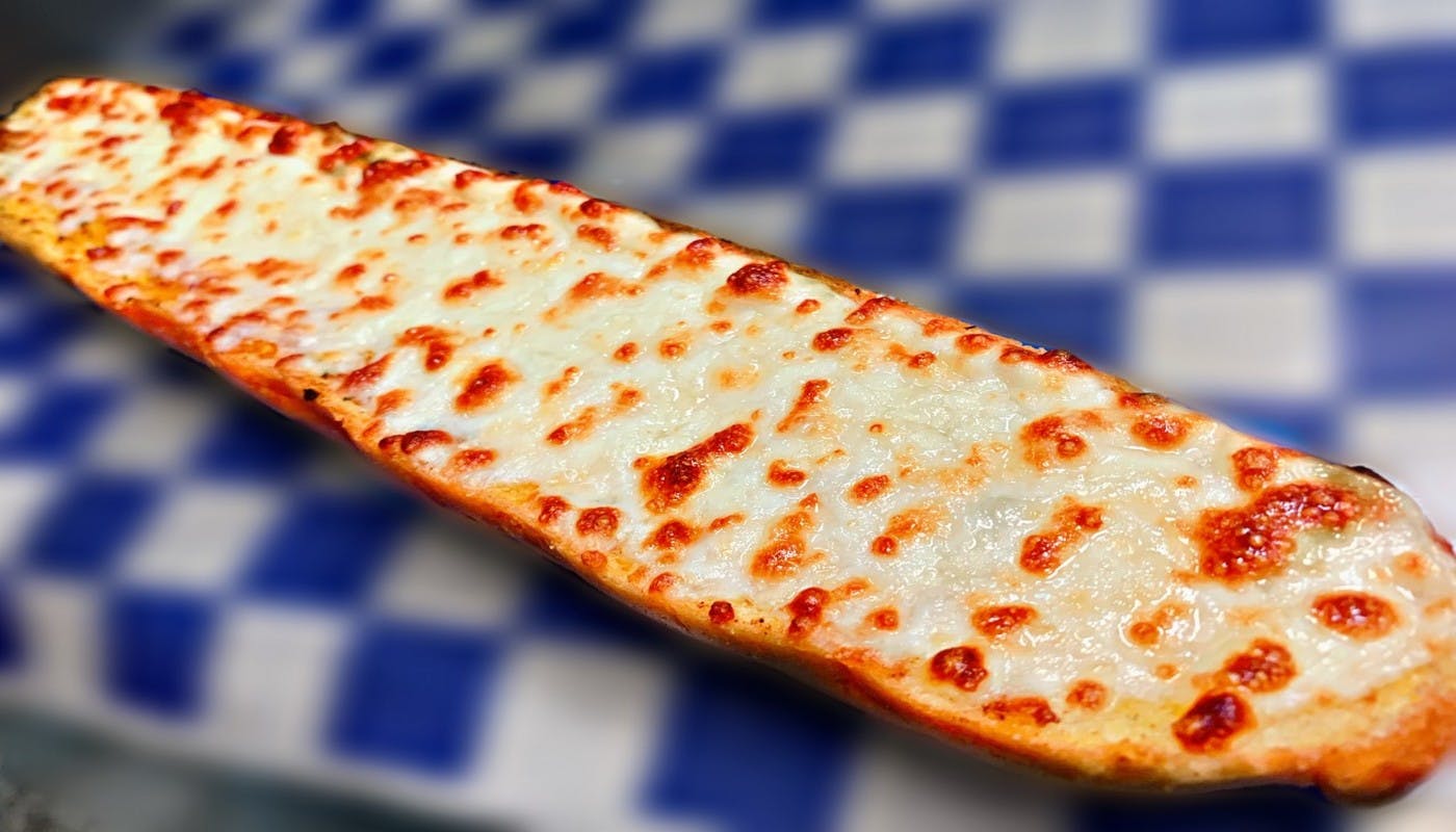 Order Cheesy Garlic Bread - Side food online from Village Pizza & Seafood store, Texas City on bringmethat.com