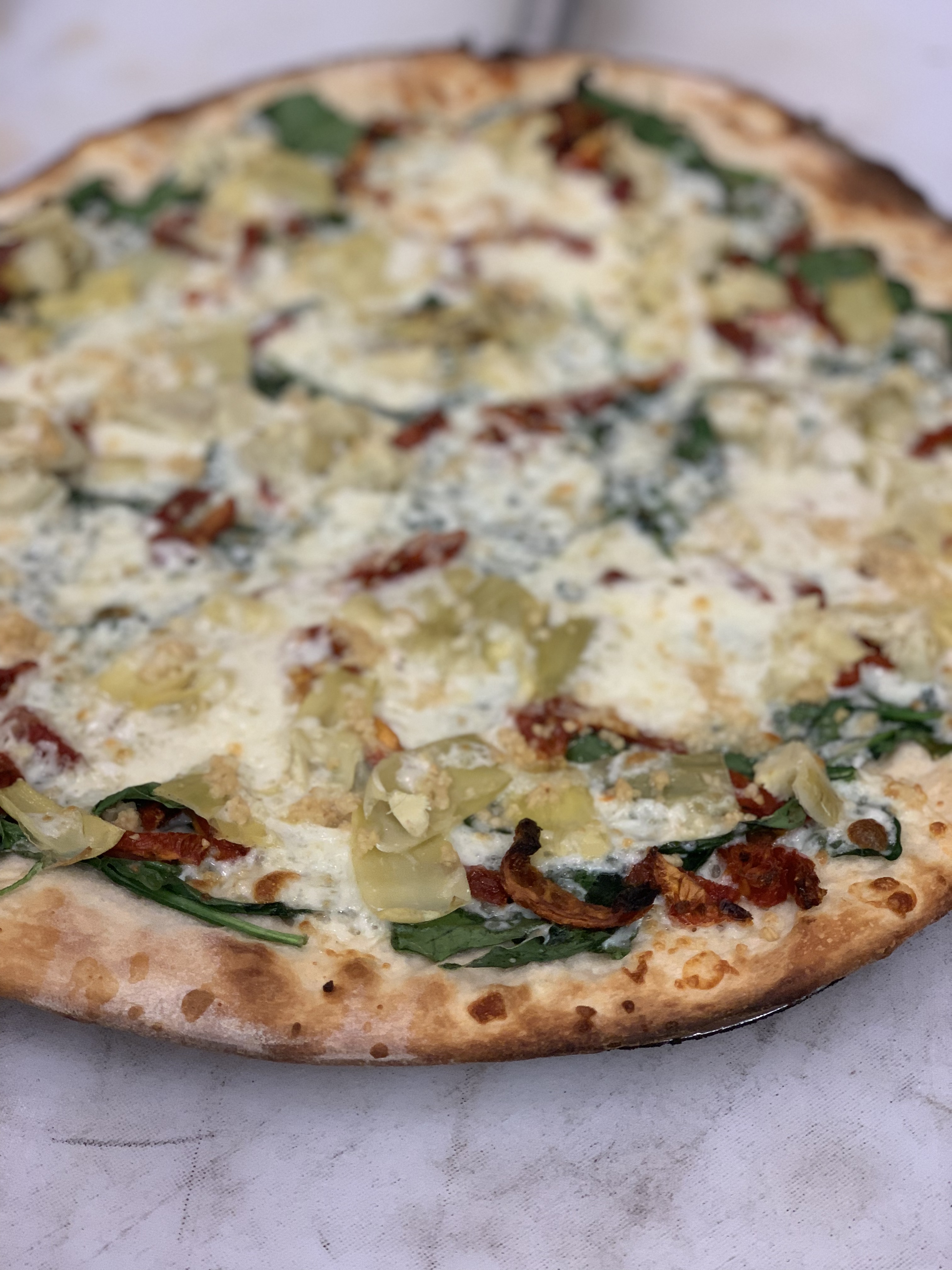Order Spinach Artichoke Pizza food online from Nobel Pizzeria store, San Diego on bringmethat.com