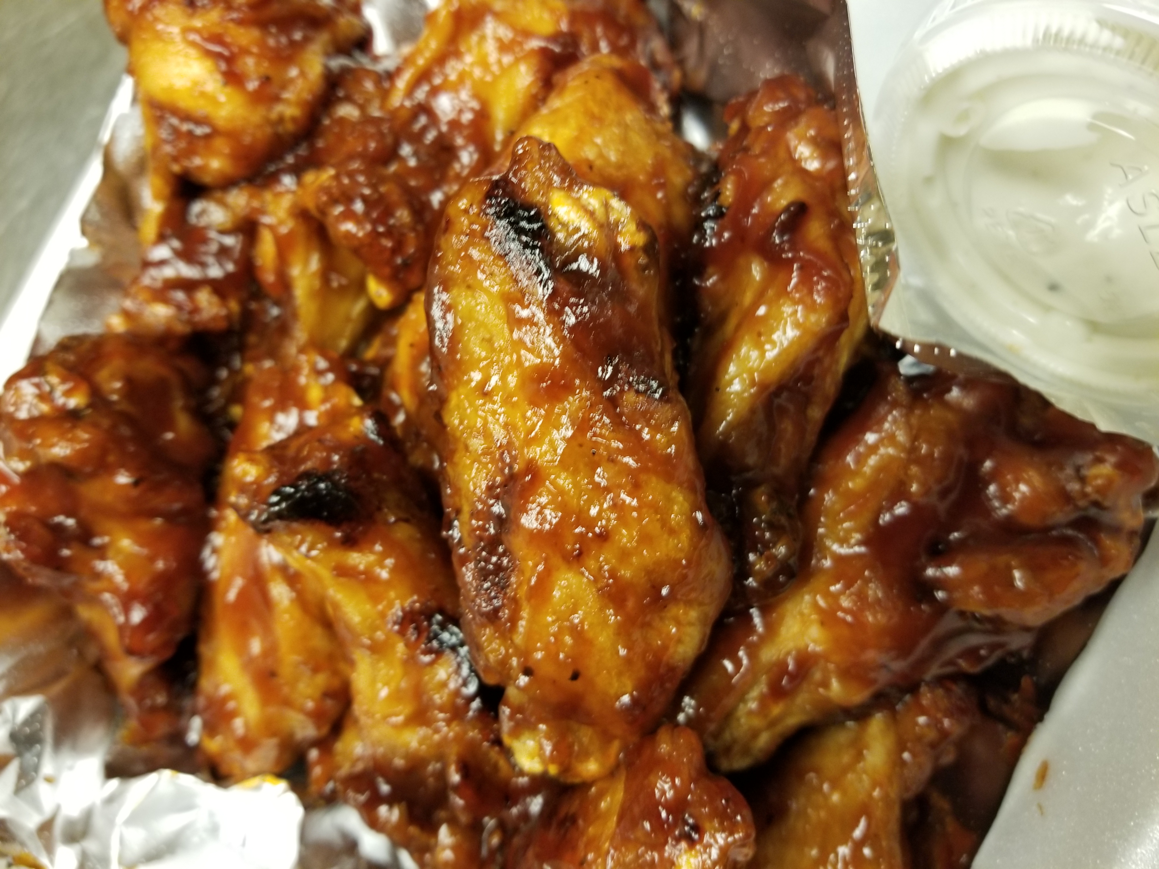 Order (10) Regular Wings food online from Sweets Lounge & Restaurant store, Buffalo on bringmethat.com