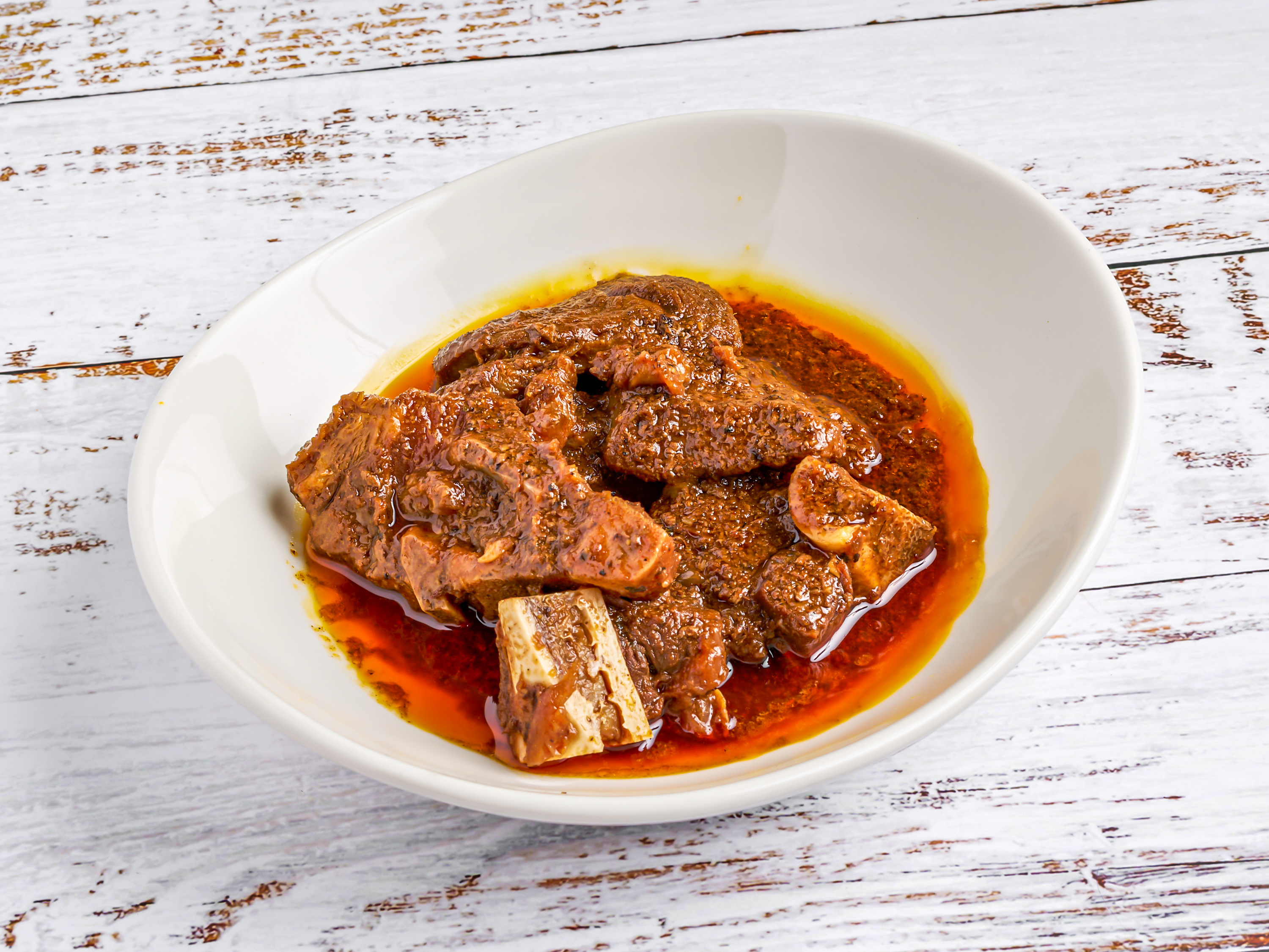 Order Goat Meat food online from Stango Cuisine store, Urbana on bringmethat.com