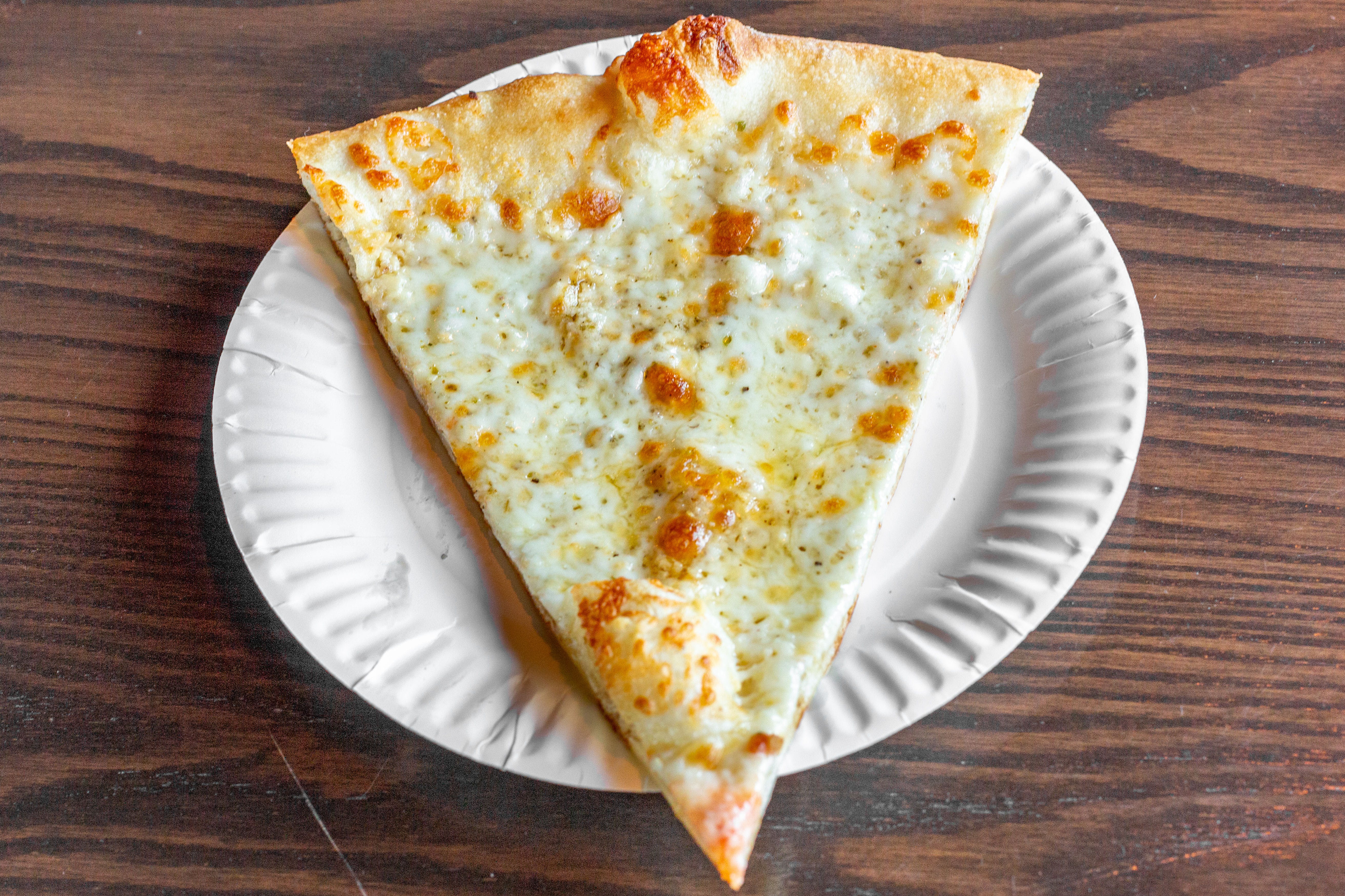 Order White Pizza - Large food online from King of Pizza store, Berlin on bringmethat.com
