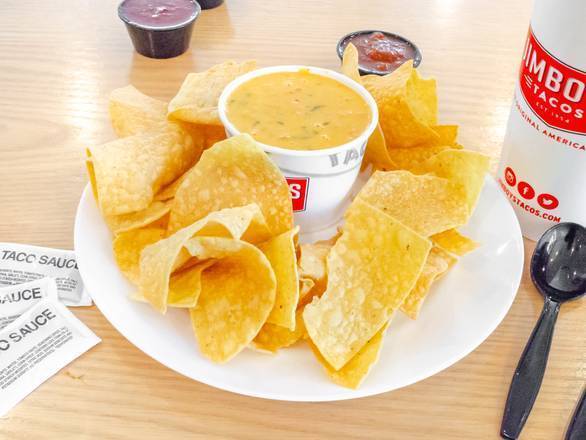 Order Queso (4 oz) &  2 Chips food online from Jimboy's Tacos store, Sacramento on bringmethat.com