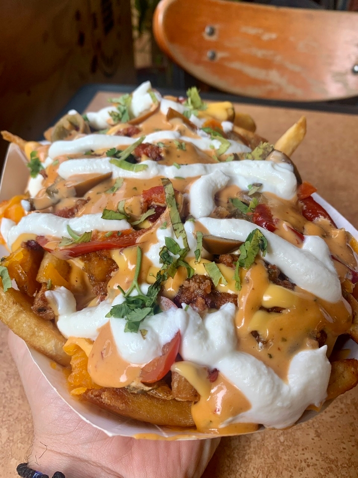 Order Nacho Fries food online from New York Burger Co. store, New York on bringmethat.com