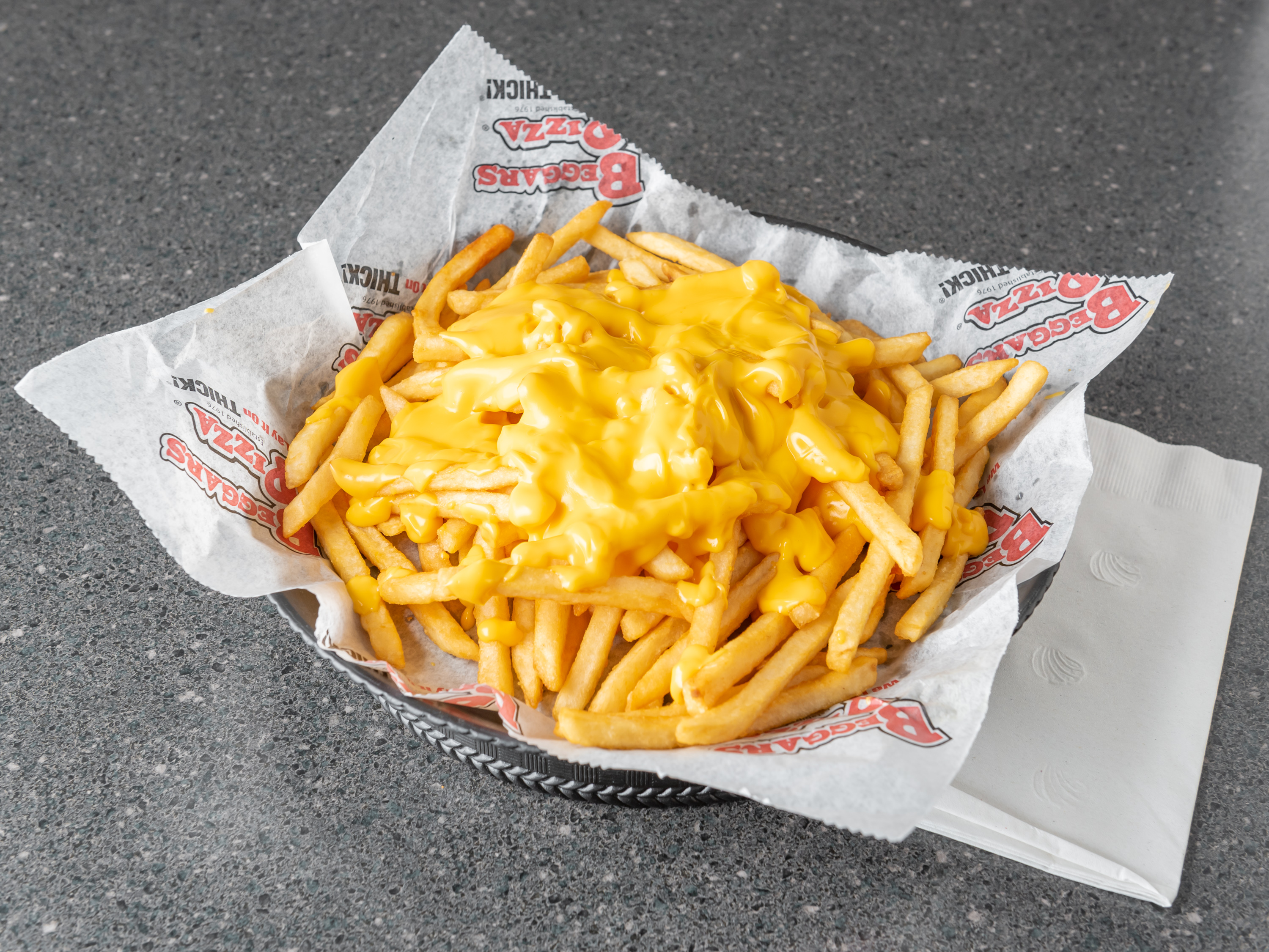 Order Cheese Fries food online from Beggars Pizza store, Blue Island on bringmethat.com
