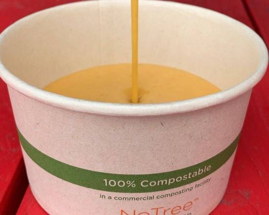 Order Side of Queso (6oz) food online from The Be-Hive store, Nashville on bringmethat.com