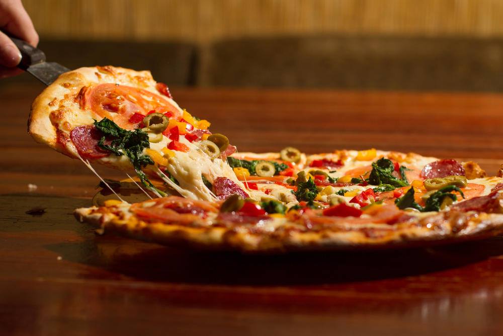 Order Vegetarian Specialty Pizza food online from Guidos Pizza store, Anchorage on bringmethat.com