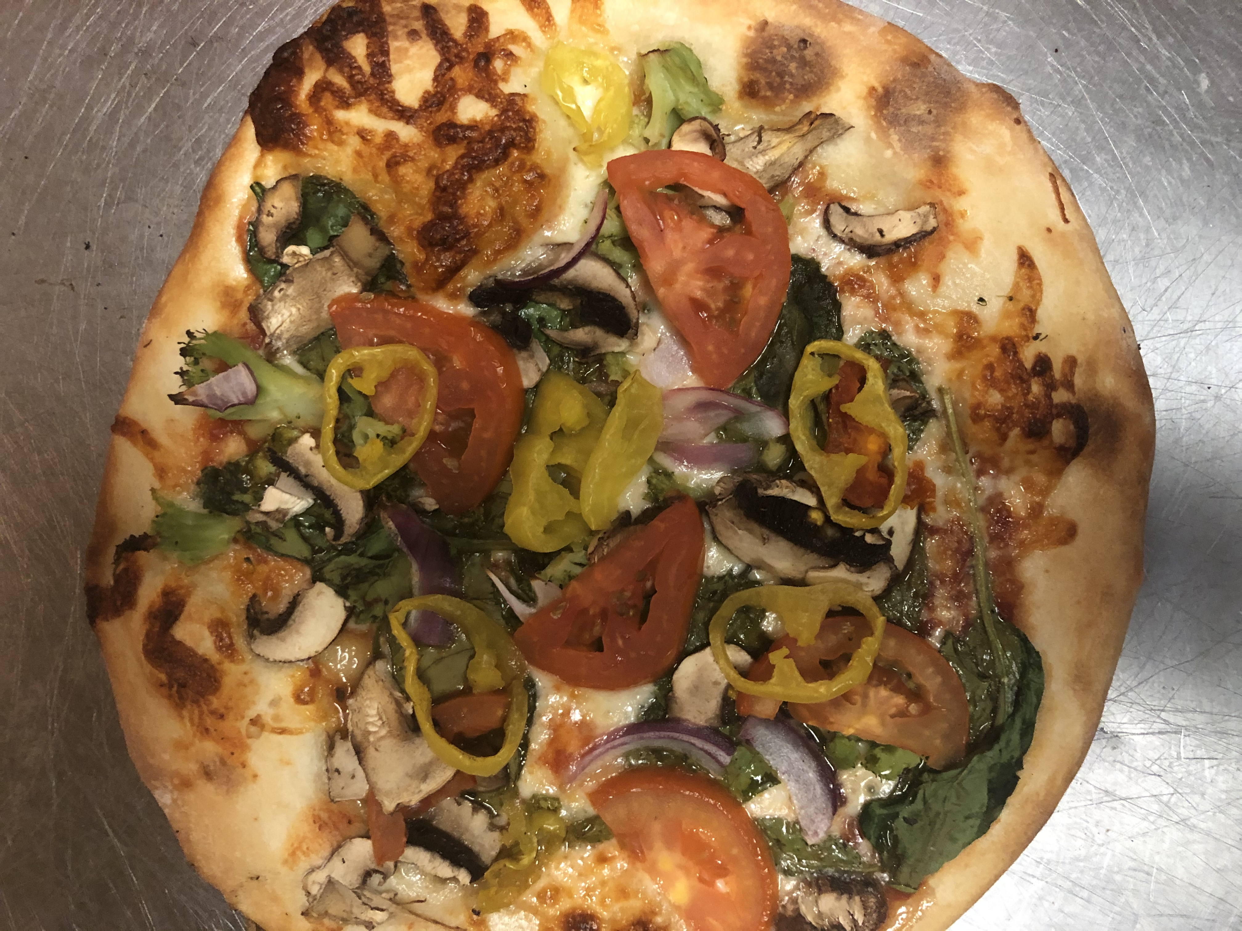Order Veggie Lovers Pizza 10”personal food online from Fabulous Pizza store, Valdosta on bringmethat.com