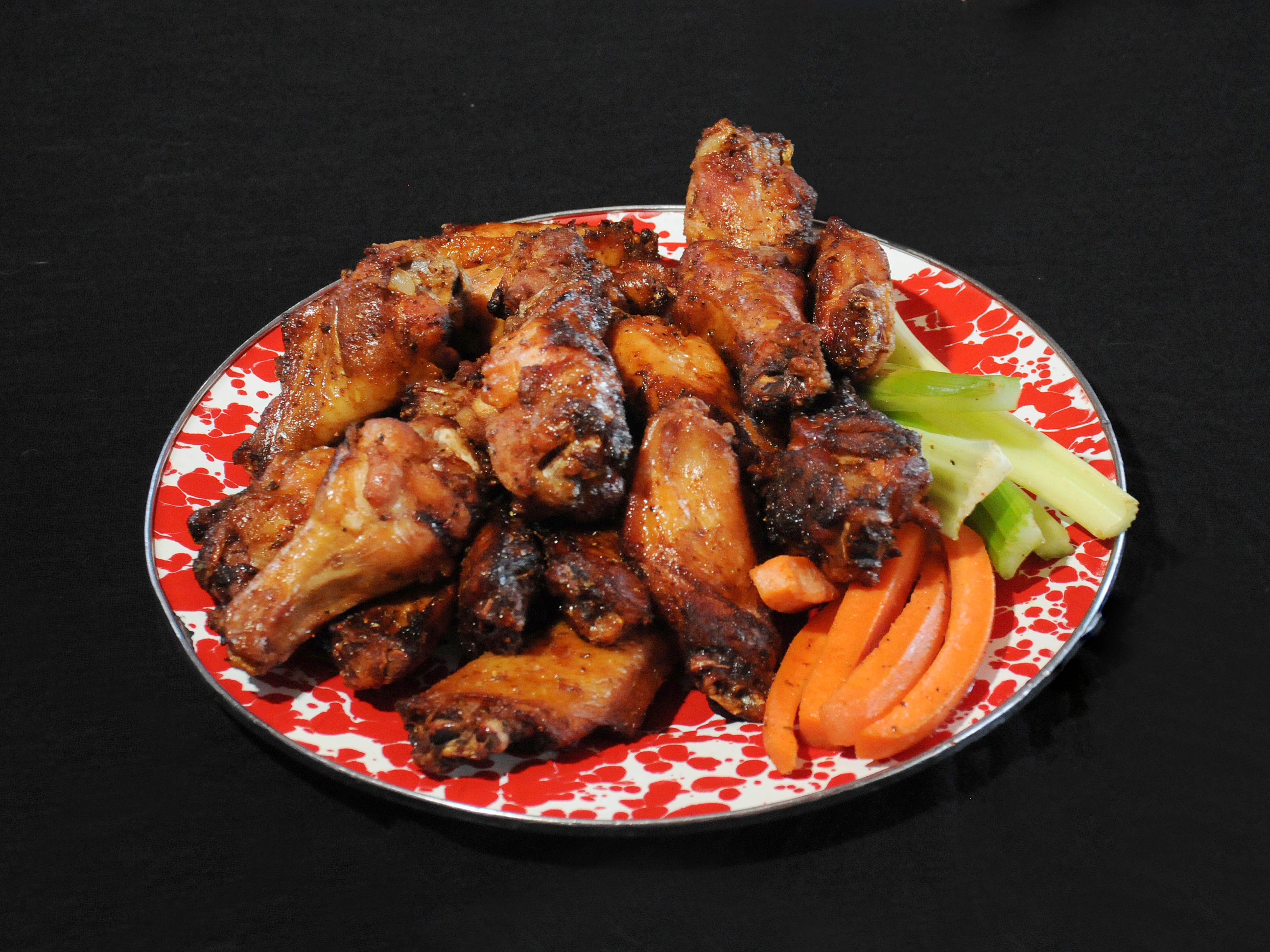 Order 10 Amazing Slow Smoked Wings food online from Jethros BBQ store, Des Moines on bringmethat.com
