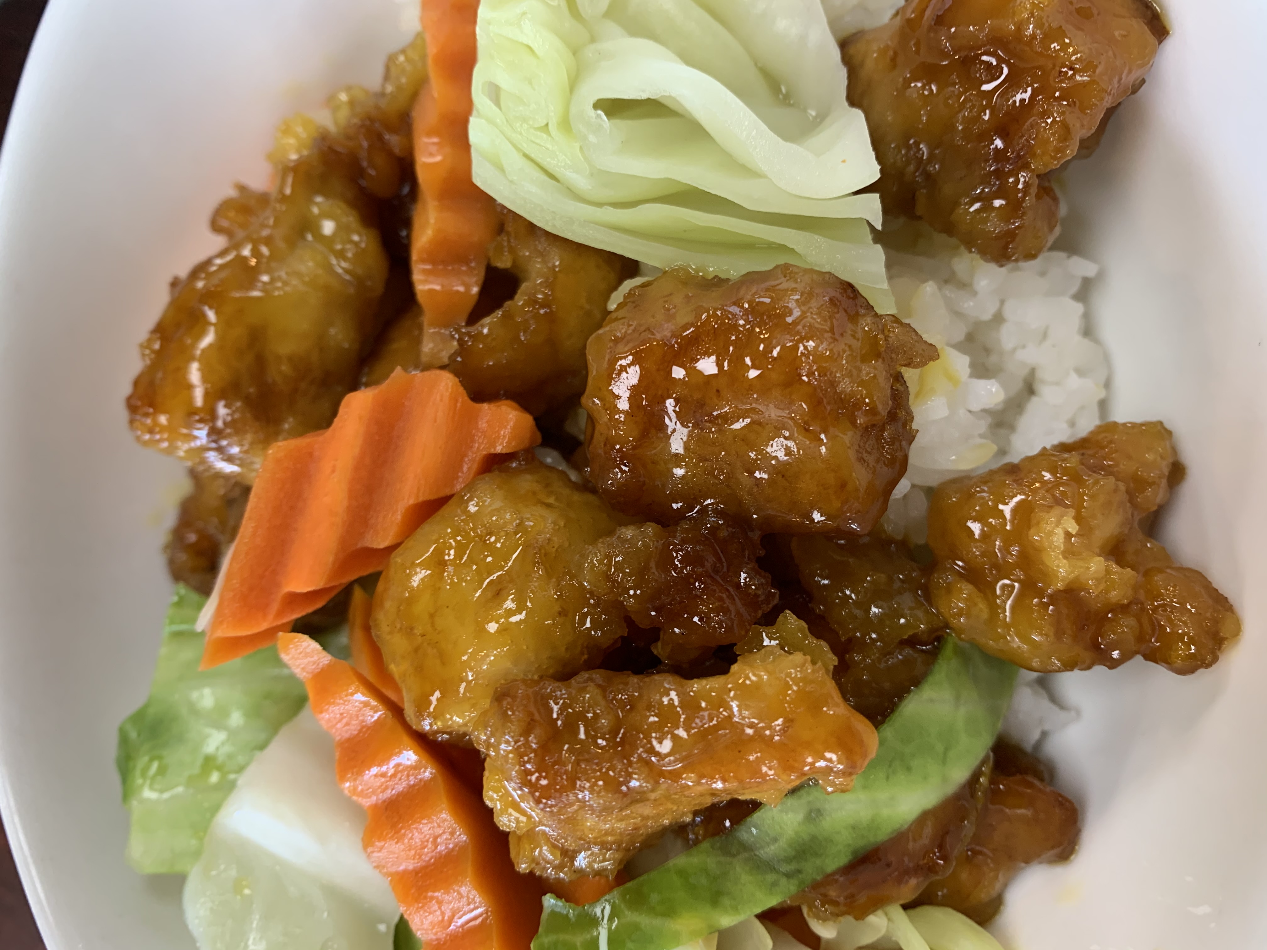 Order Orange Chicken food online from Asiana Foods store, Fort Collins on bringmethat.com