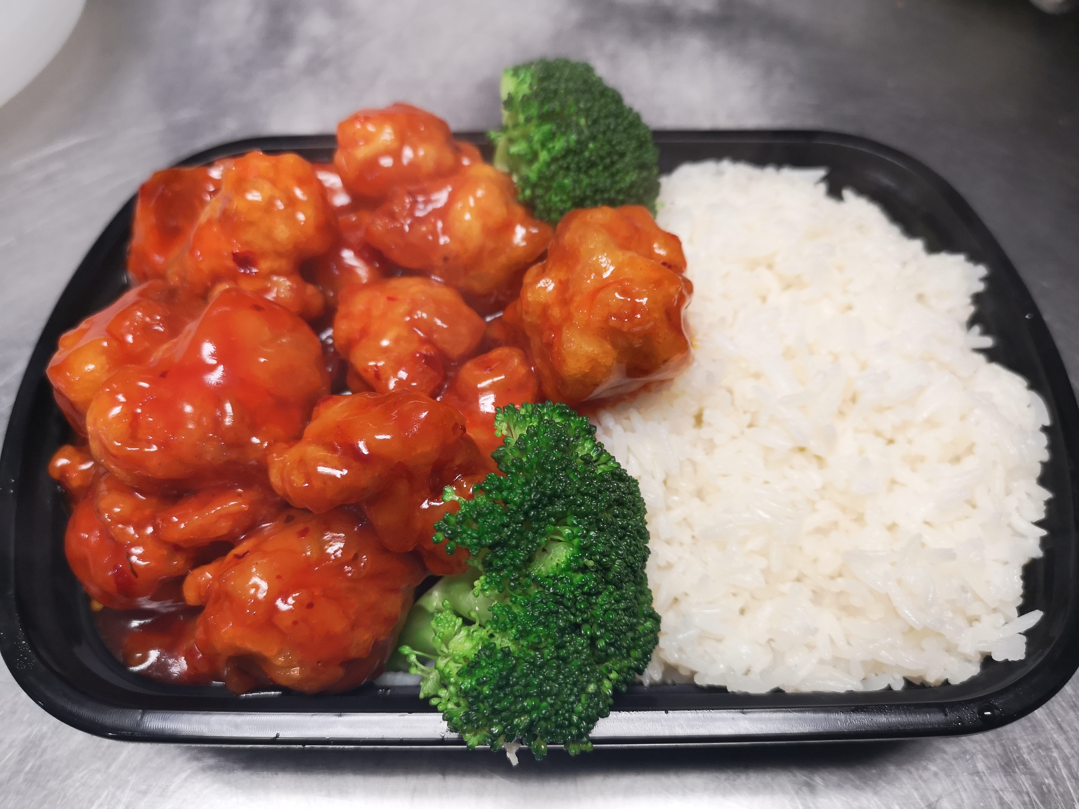 Order C12. General Tso's Chicken Combination Plate food online from Chans Gourmet store, Kearny on bringmethat.com