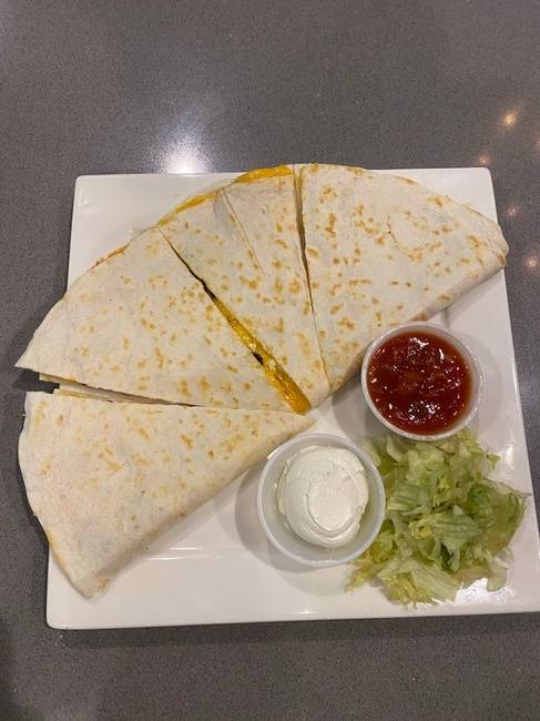 Order Ed’s Quesadilla food online from Lou & Harry's - E Grand River store, East Lansing on bringmethat.com
