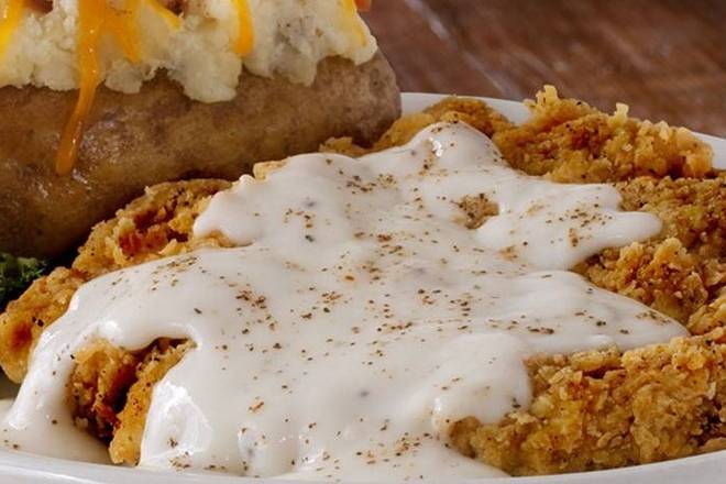 Order Chicken Fried Steak food online from Montana Mike's Steakhouse store, Bartlesville on bringmethat.com