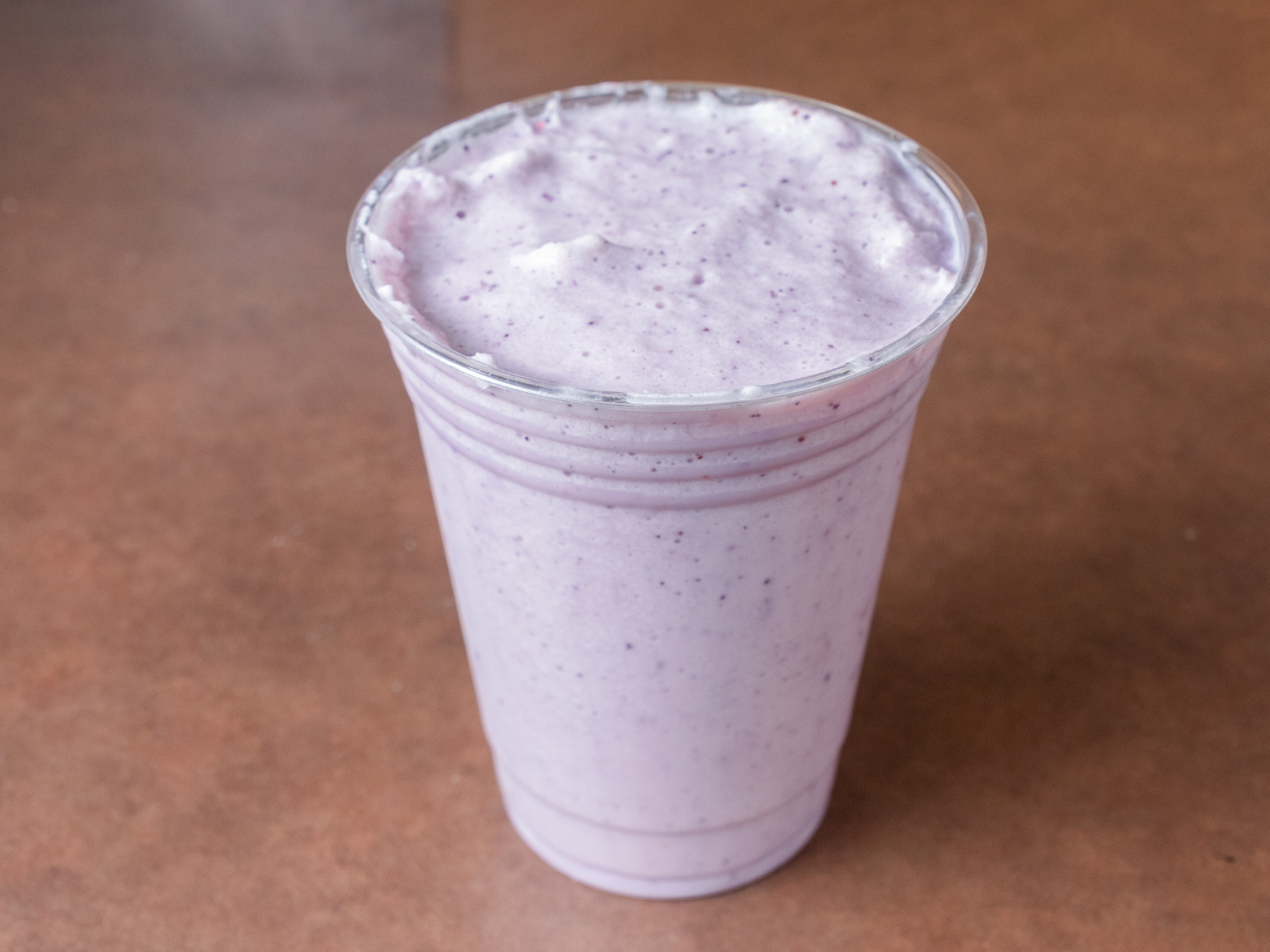 Order Mango Berry Smoothie food online from Cafe Brazil store, Chamblee on bringmethat.com