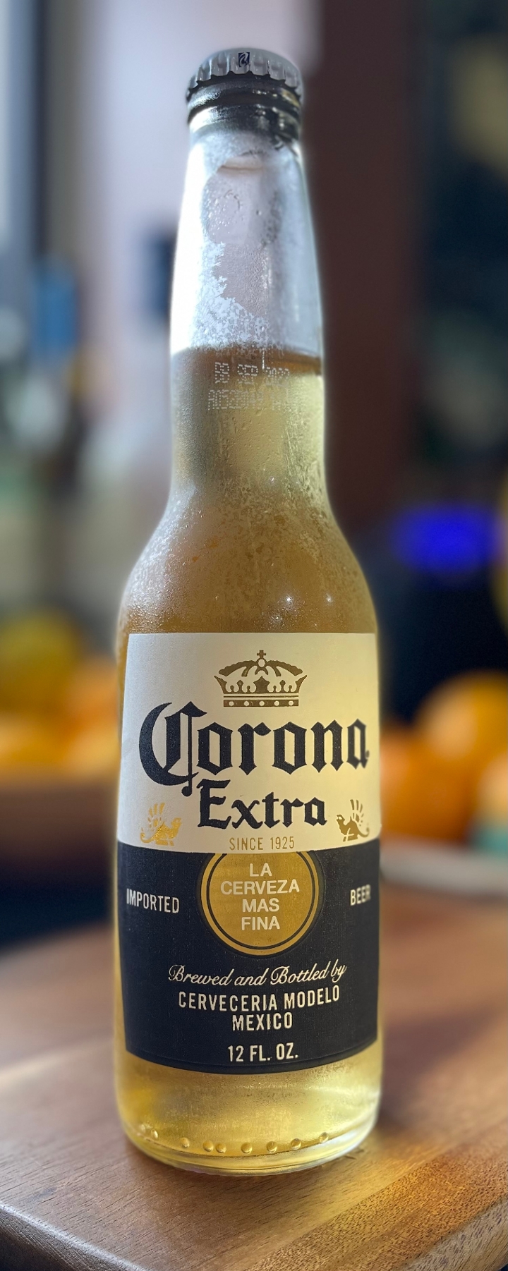 Order CORONA EXTRA BOTTLE food online from Leo's Coney Island store, Sterling Heights on bringmethat.com