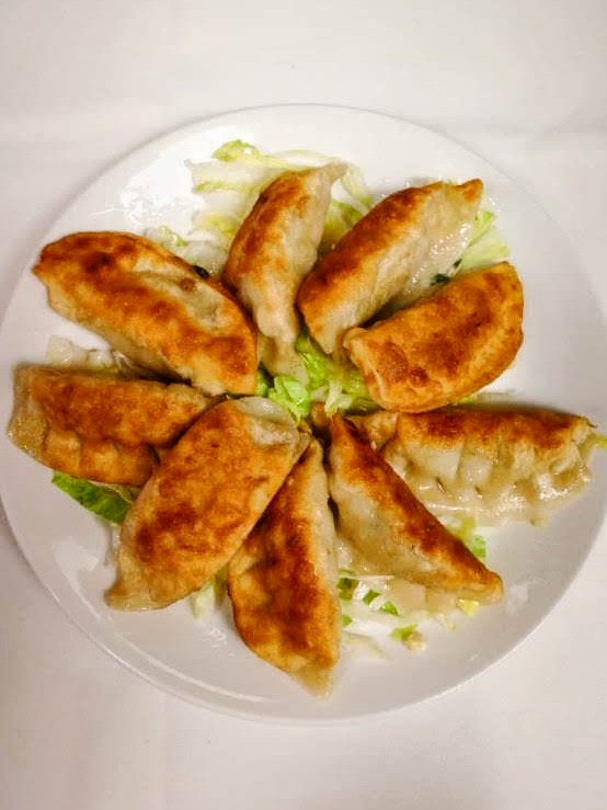 Order 2. Pot Stickers food online from Kirin Chinese Restaurant store, Mountain View on bringmethat.com