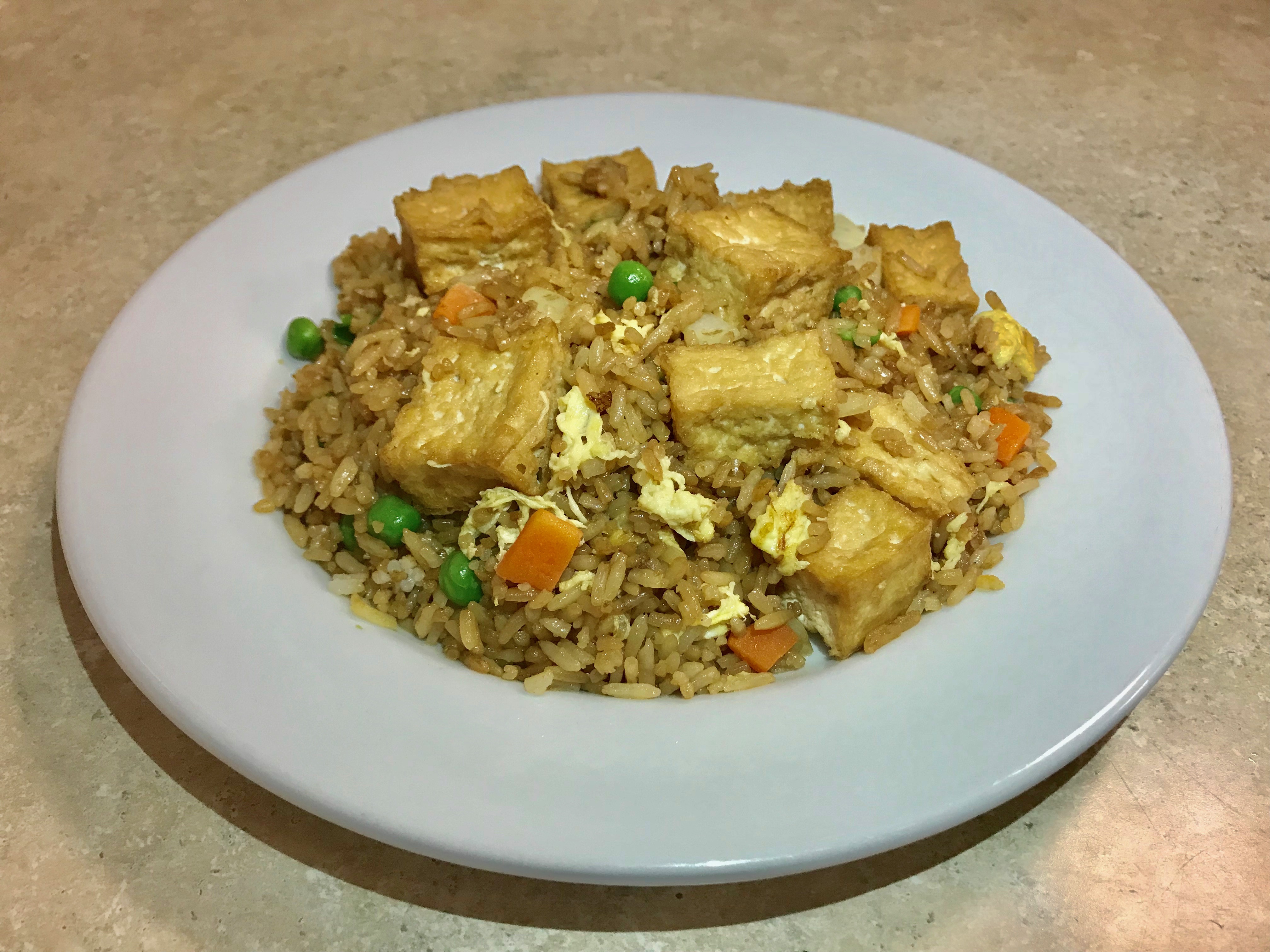 Order P18. Tofu Fried Rice food online from China Island store, Mansfield on bringmethat.com