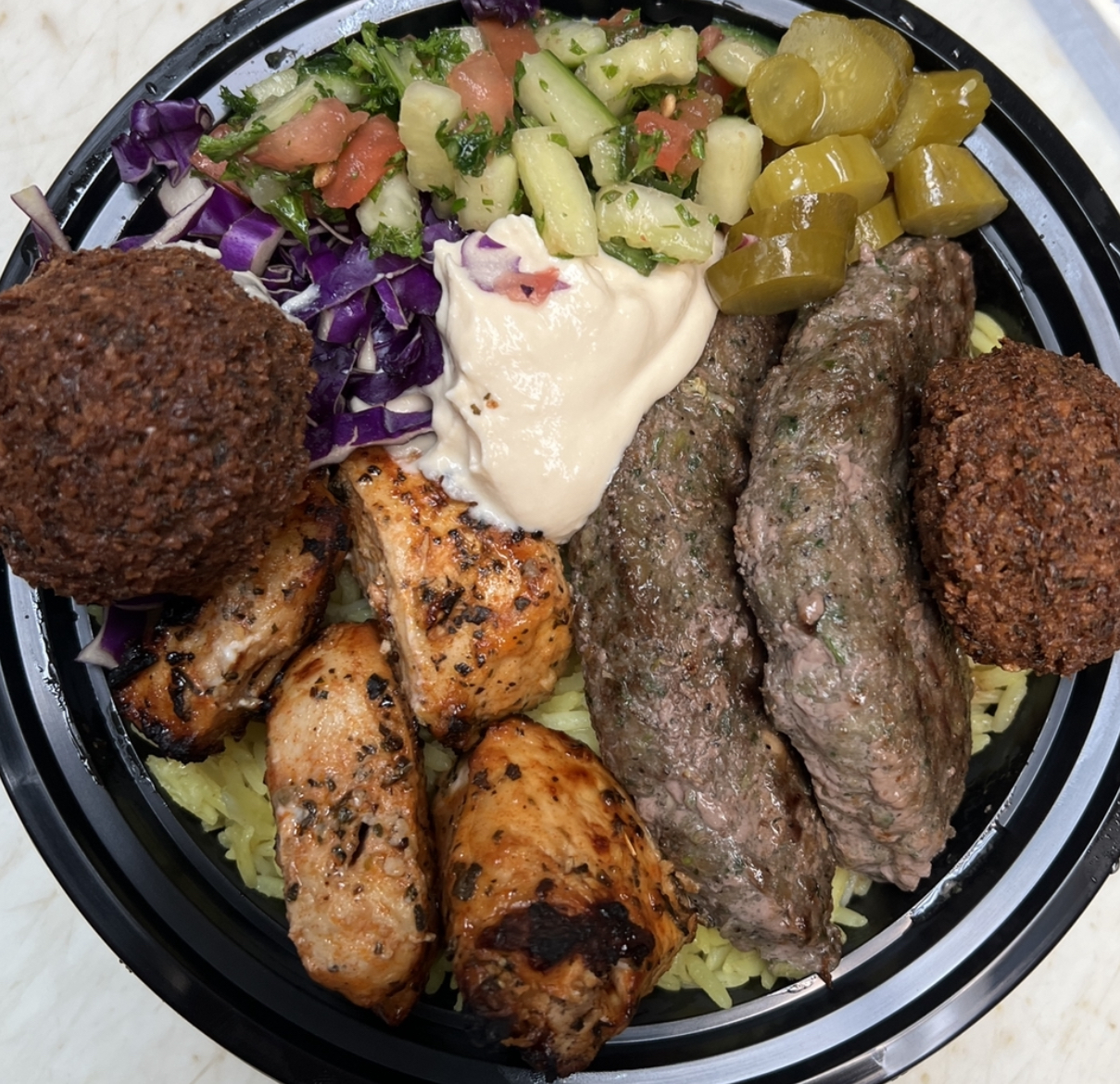 Order Desert Storm Bowl ( Beef Kafta, Chicken Kababs and Falafel )  food online from Zam zam middle eastern grill store, Chicago on bringmethat.com