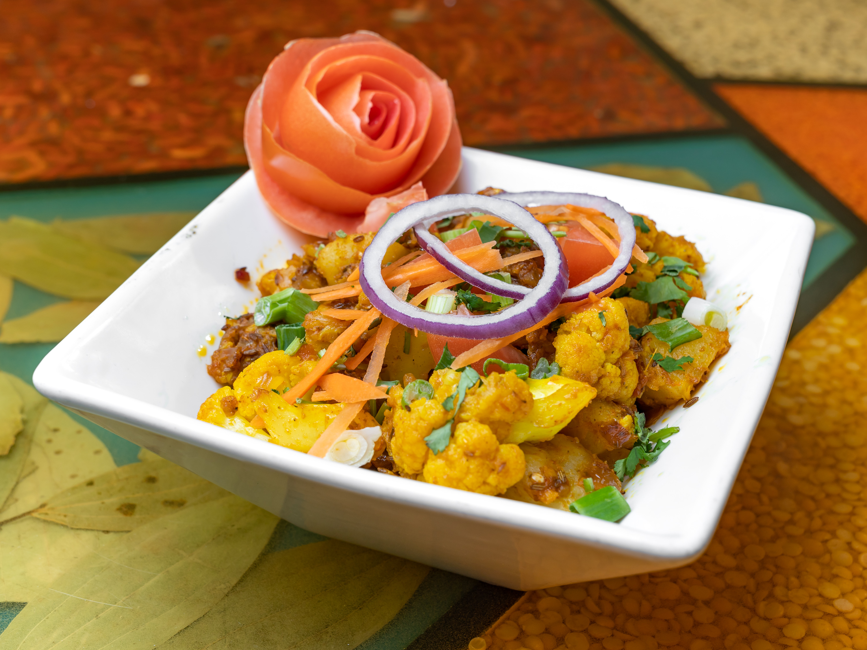 Order Aloo Gobi food online from Singhs Cafe store, Wellesley Hills on bringmethat.com