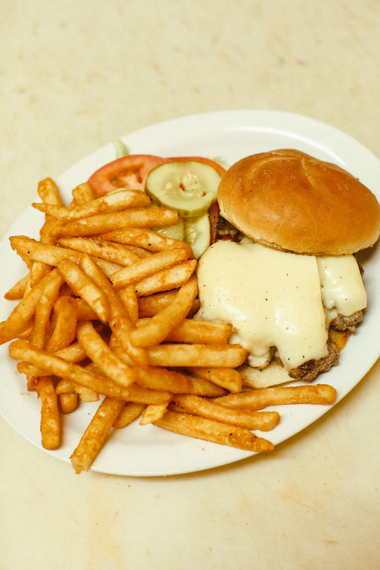 Order Burger - 1/2 lb. food online from Mama Luke store, Farmington on bringmethat.com