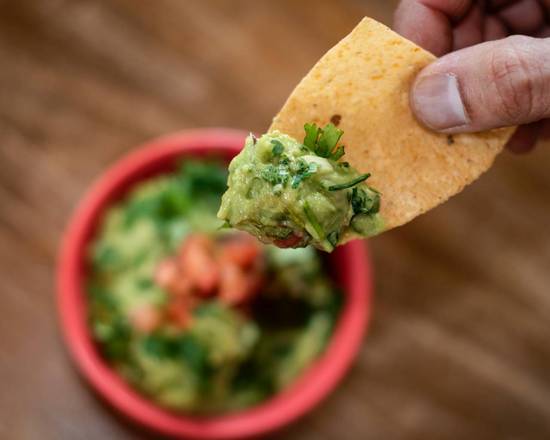 Order Hand-hacked Hass Avocado Guacamole and Chips food online from Taco Ocho store, Flower Mound on bringmethat.com