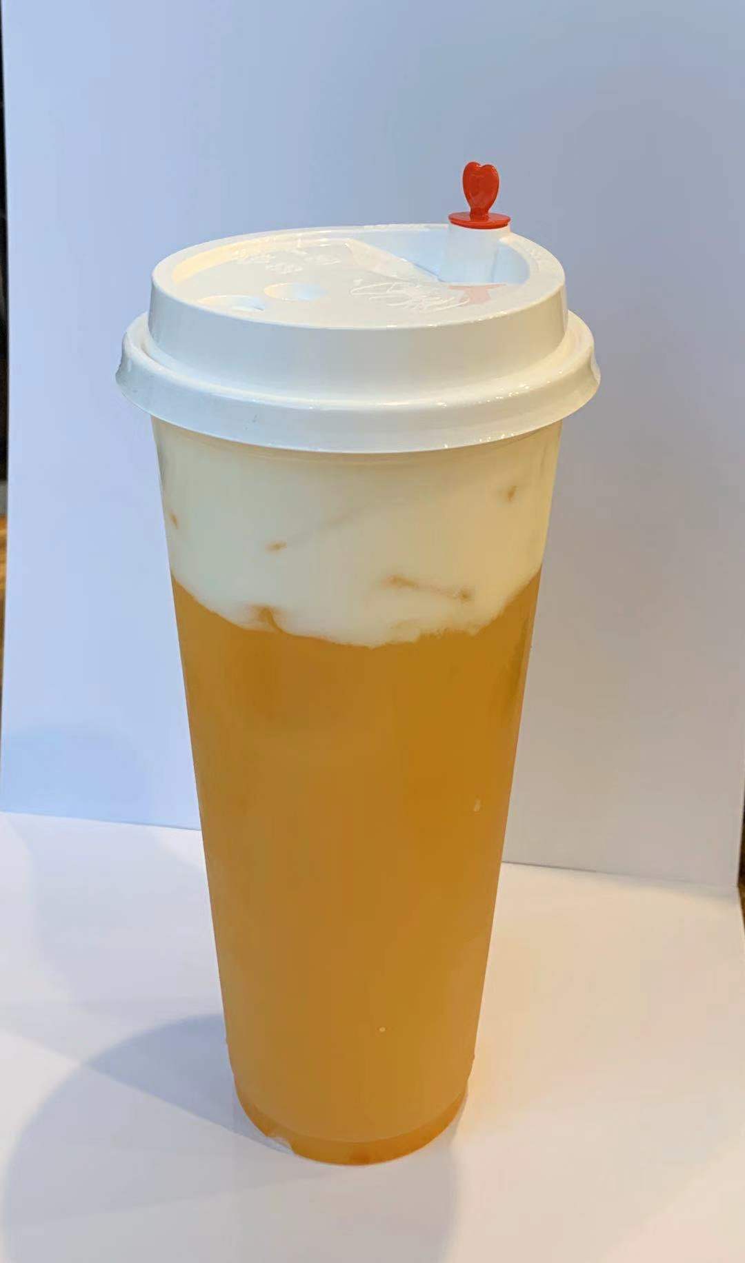 Order Passionfruit Yogurt Tea with Cream food online from Domoishi store, Newport News on bringmethat.com