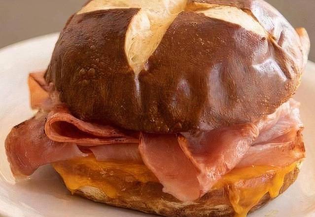 Order Pretzel Bun Sandwich - Ham & Cheese food online from Sweetwaters Coffee & Tea store, Canton on bringmethat.com