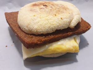 Order SCRAPPLE EGG AND CHEESE ON ENGLISH MUFFIN food online from Millers Country Kitchen store, Middletown on bringmethat.com