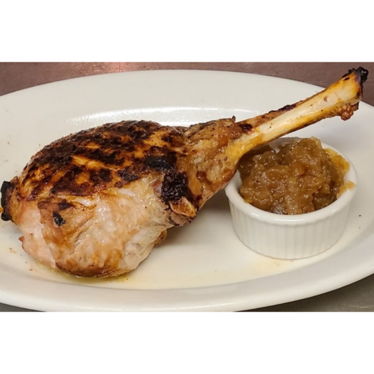 Order Kurobuta Bone-in Pork Chop food online from LG's Prime Steakhouse store, La Quinta on bringmethat.com