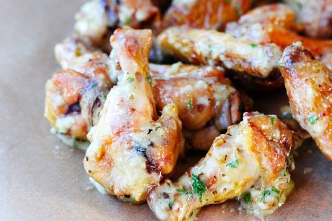 Order Garlic Parmesan Wings (10) food online from Bailey Seafood store, Buffalo on bringmethat.com