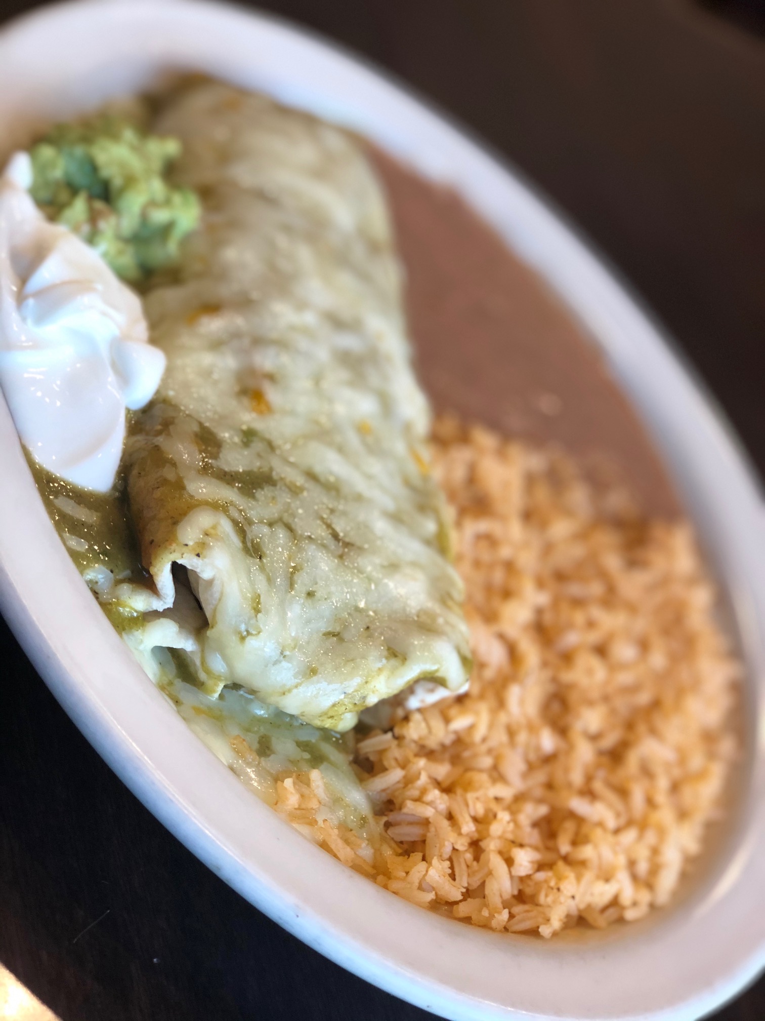 Order Chile Verde Pork Burrito food online from Fiesta Mexican Restaurant store, Kennewick on bringmethat.com