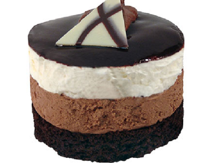 Order Gourmet White Chocolate Mousse Cake food online from Victory Soul Food store, Detroit on bringmethat.com