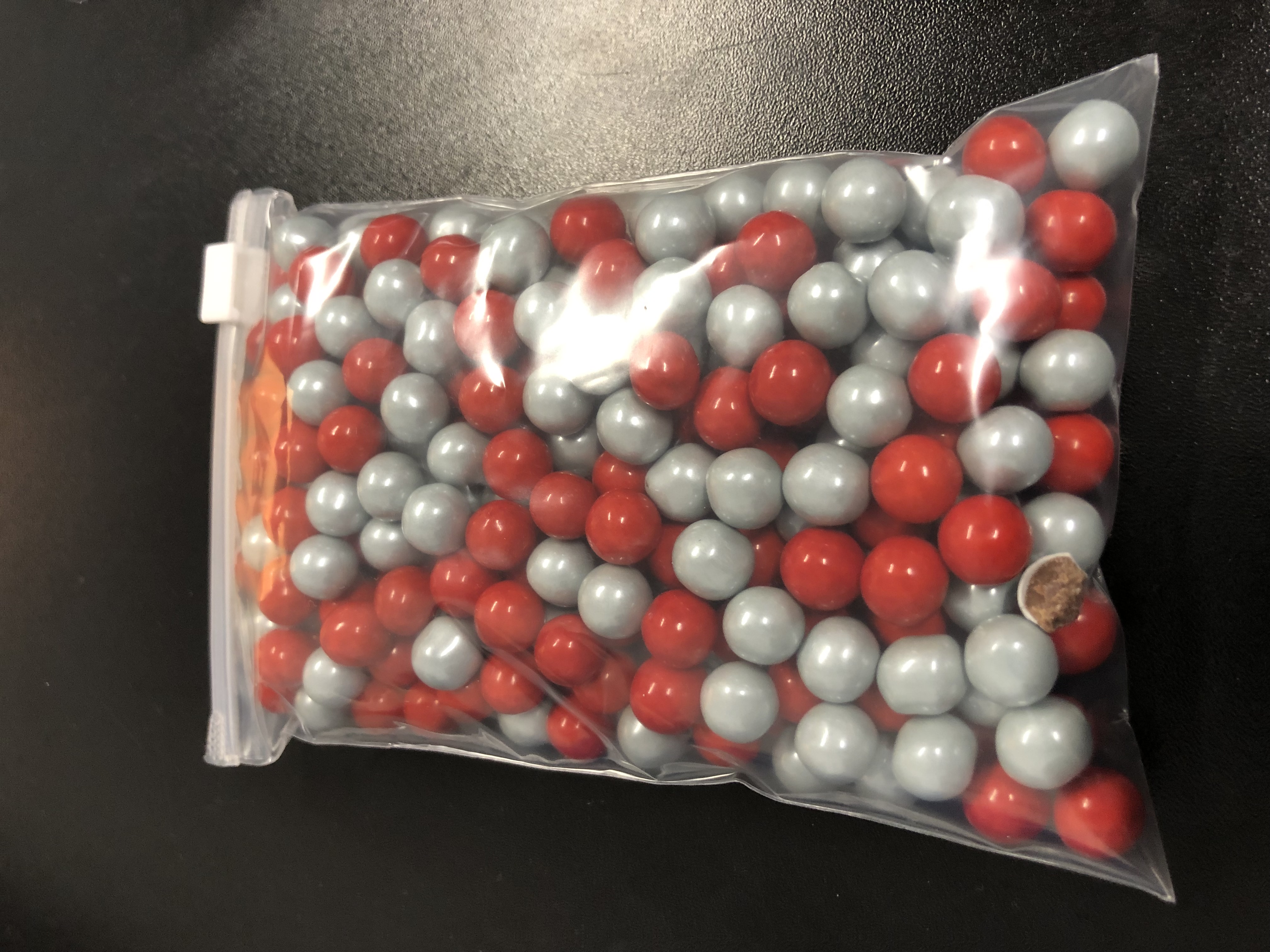 Order Red/Grey Spirit Mix Sixlets - 1/2 lb Bag food online from Buckeye Candy Company store, Columbus on bringmethat.com