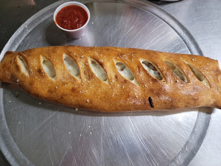 Order Stromboli - Individual food online from Village Pizza Too store, Churchville on bringmethat.com