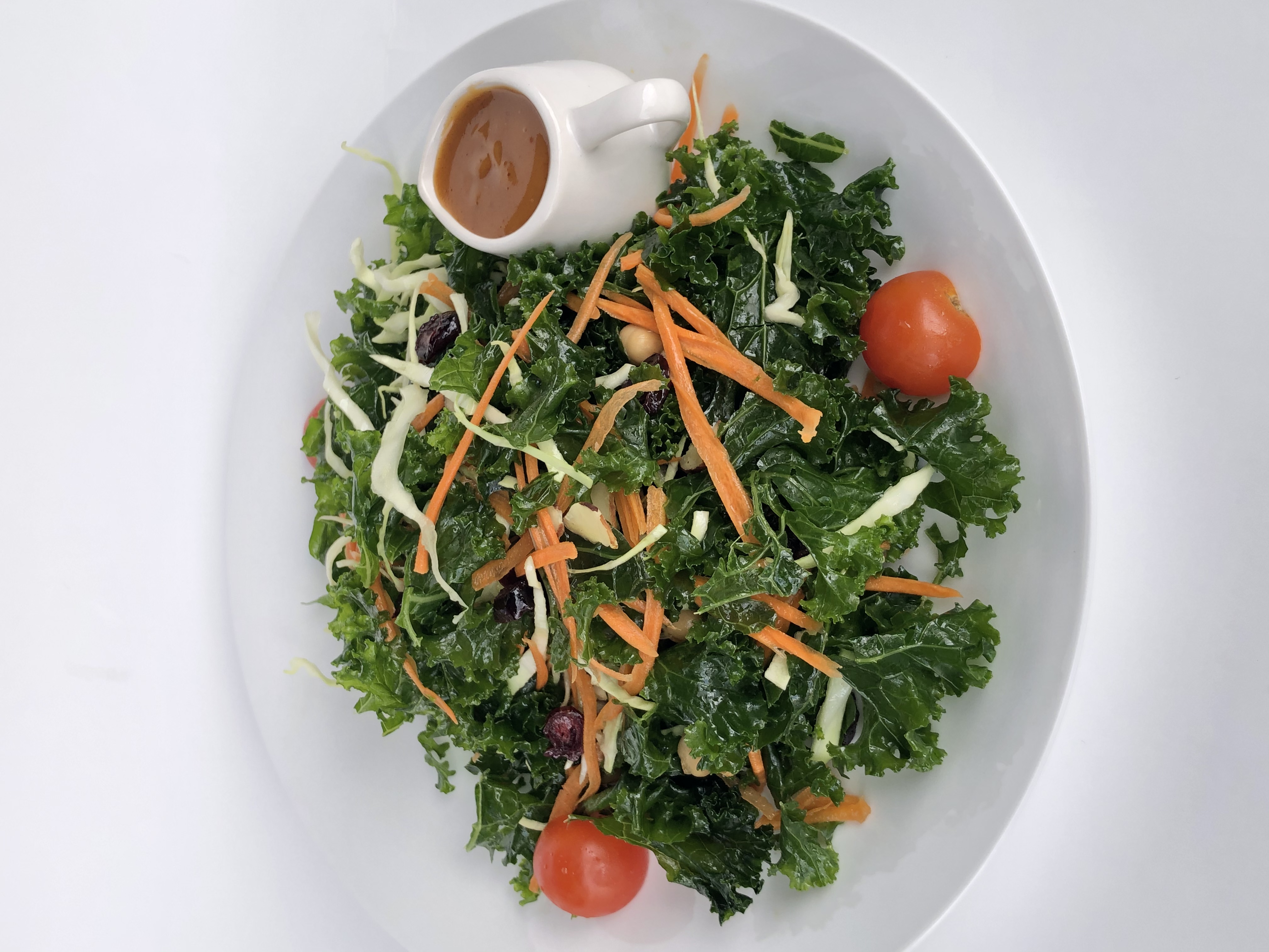 Order Kale Salad food online from Nom Station store, Marietta on bringmethat.com