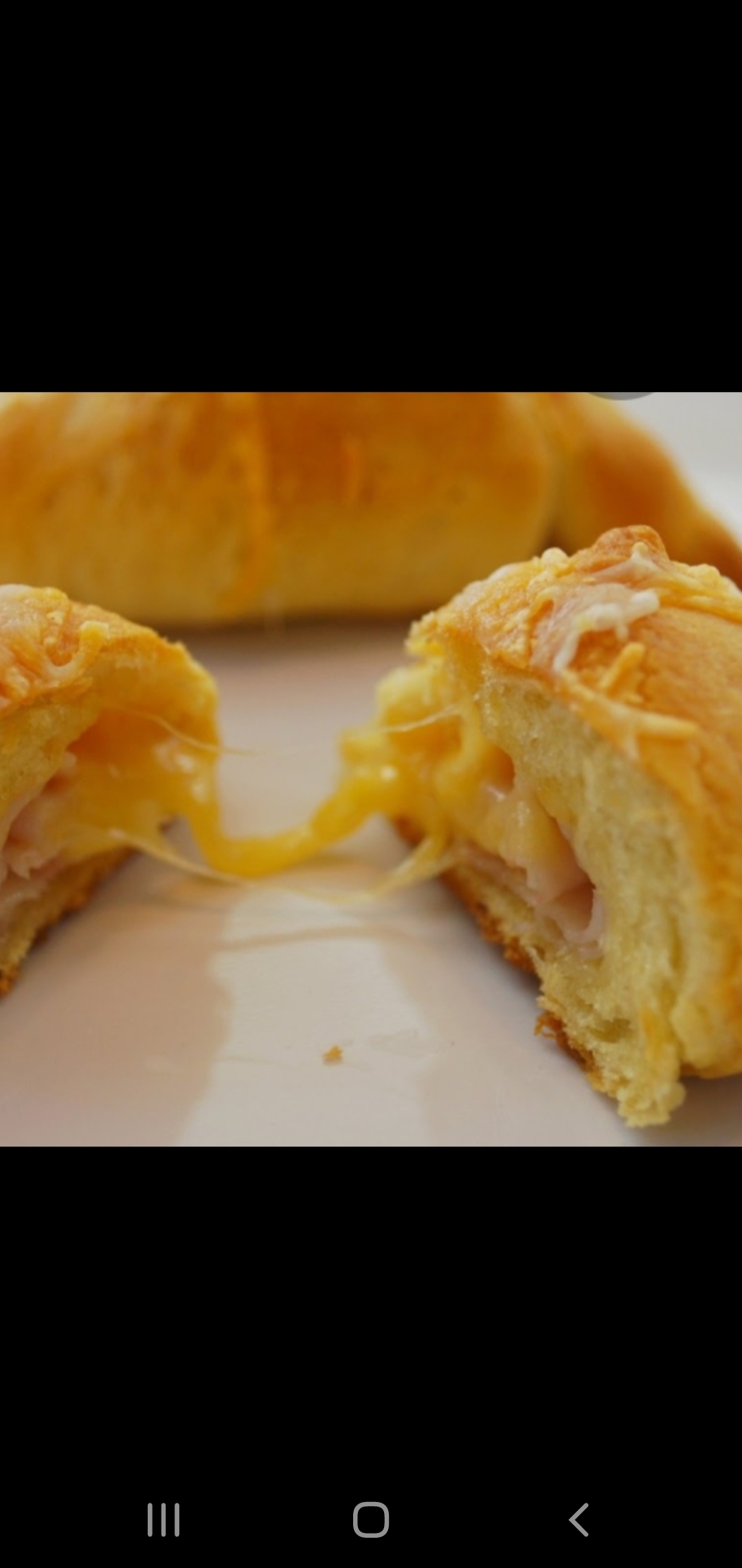 Order Croissant Toasted With Melted Cheese  food online from American Gourmet Foods Deli store, New York on bringmethat.com