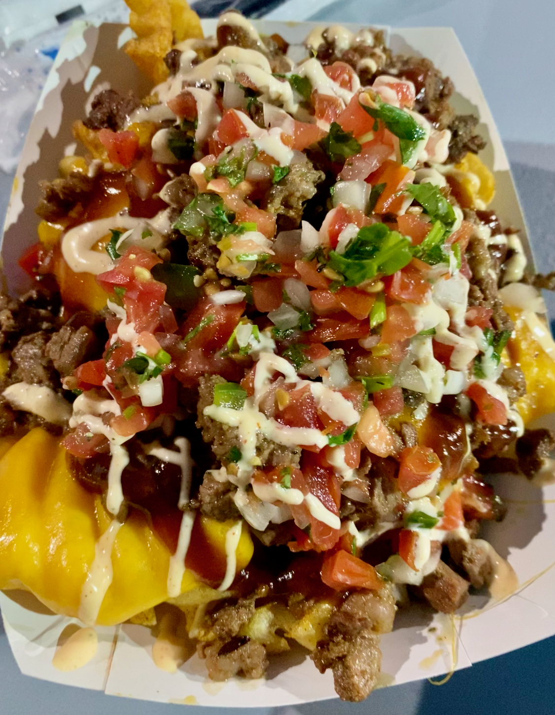 Order Meaty Tricky Trio Fries food online from Chaparritos Grill store, Palm Desert on bringmethat.com
