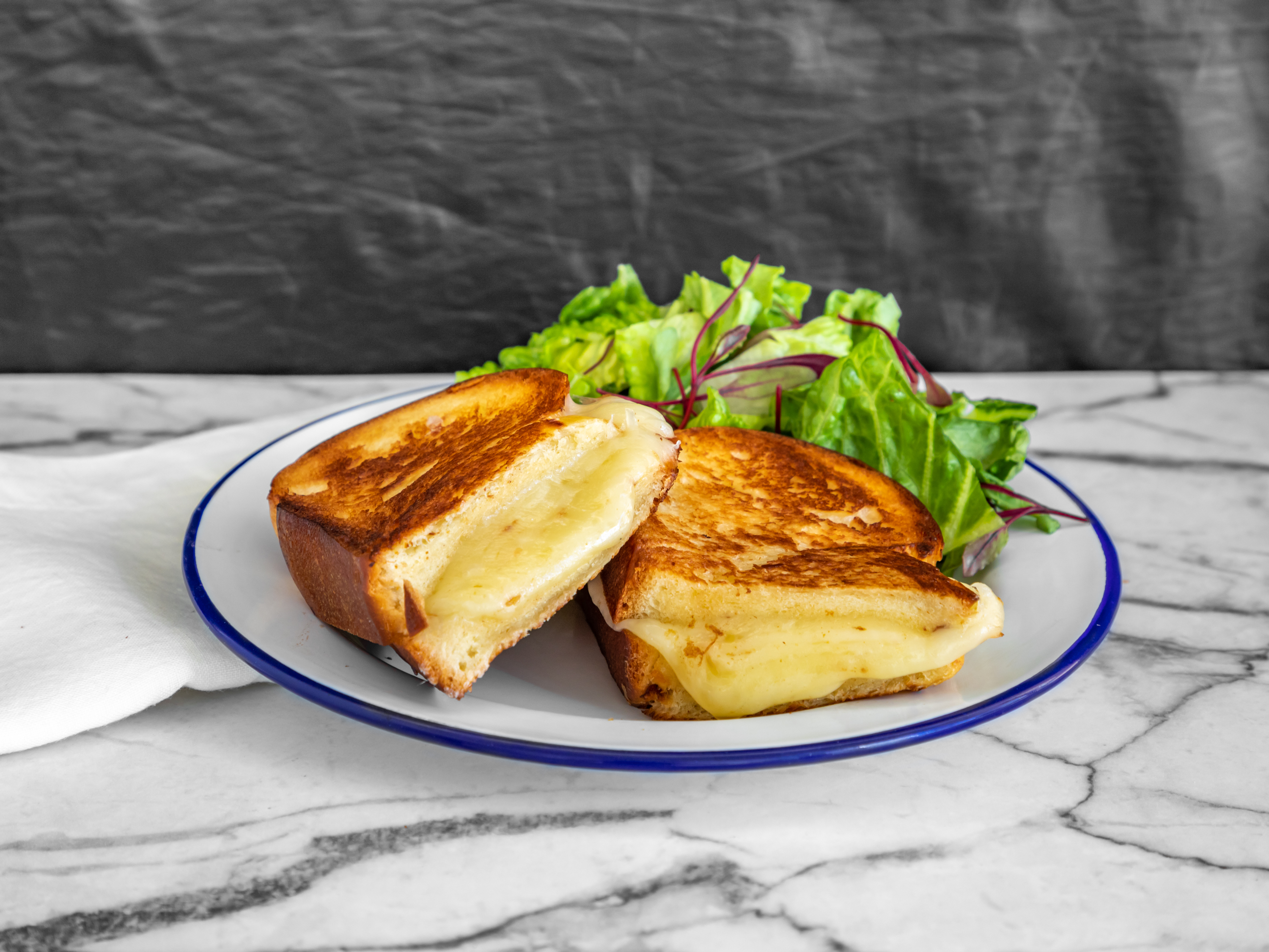 Order Grilled Cheese Sandwich food online from Café Lovi store, Santa Monica on bringmethat.com